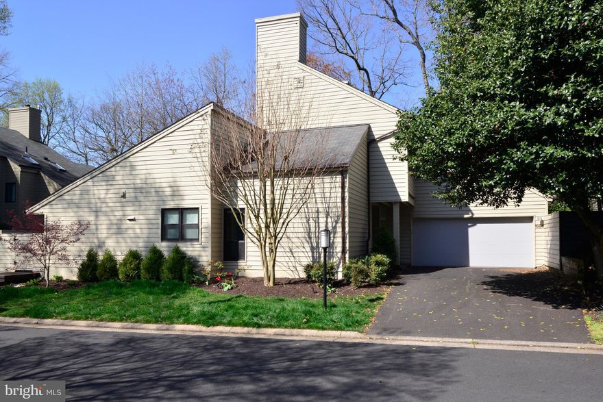 Welcome to Solaridge Court in sought-after South Reston!  This updated and upgraded Sunburst model features the owner's suite on the main level, and it has two additional bedrooms and a full bathroom on the upper level!  The kitchen has stainless steel appliances, quartz countertops, and a sliding glass door to the wrap-around deck.  It also shares a two-sided gas fireplace with the living room.  The living room features hardwood floors, built-ins, skylights, and an open design. The dining room is located off of the kitchen and offers great space for entertaining. The owner's suite has a sliding glass door to the wrap-around deck and offers a great retreat.  The owner's suite bath has been beautifully-updated with a gorgeous shower, double vanity sinks and a separate water closet.   There is also a powder room and separate laundry room on this level.  The home also features a spacious, two-car garage.  The location is fantastic!  Just down the street is Lake Audubon and the Lake Audubon Pool.  And all of Reston's trails are at your door...including the Glade Trail, the Twin Branches Trail, and the Cross County and W& OD Trails.  And for the commuters - easy access to the Dulles Toll Road, Route 7, Reston Parkway - and you are close to the Silver Line Wiehle Ave. Metro! Upgrades and Updates: Owner's suite closet (2016), Owner's Suite bathroom remodeled (2016), Upper Level Full Hall Bathroom remodeled (2016); all windows and sliding glass doors are Andersen Renewal (2016); New driveway (2018); Trane HVAC (2015);  Fireplace converted to gas with new fronts (2016); Trex deck and back stairs (2015); Garage door (2015); Washer and Dryer (2019); Dishwasher (2019); Microwave (2015).