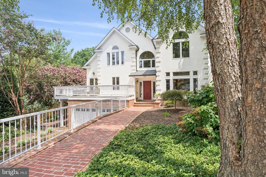 NEW ON MARKET! 

This superb Craftsman-style home blends timeless character with modern comfort in one of the most sought-after neighborhoods, Cabin John. Exquisitely and thoughtfully created for timeless elegance, this well-appointed home achieves the perfect harmony between luxury and the comforts of everyday living. Surrounded by lush greenery, the expansive grounds offer a wealth of privacy and exclusivity like no other. The gracious floor plan flows seamlessly from indoors to out, ideal for entertaining. Thoughtfully refreshed with professional landscaping and fresh interior updates, this home is as inviting as it is impressive. 

Step inside to discover over 4,000 square feet of beautifully finished living space, featuring 5 bedrooms and 4.5 bathrooms, including a flexible layout ideal for today’s lifestyle. Three fireplaces, one gas and two wood-burning—add warmth and charm throughout.

Every room speaks to quality and care: hardwood floors, abundant custom built-ins, vaulted ceilings, and expansive windows and skylights that fill the home with natural light. The gourmet kitchen boasts granite countertops, premium stainless steel appliances, and opens to a sunny breakfast area and great room. An elegant dining room, a dedicated home office, and a living room with a wood-burning fireplace offer both function and style.

Upstairs, the home currently offers three spacious bedrooms, including a luxurious primary suite with vaulted ceilings and a spa-like bath. The second bedroom is a true en suite, offering its own private full bath. The third bedroom—an expansive space created by combining two original bedrooms—has a full bathroom accessed from the main hallway. If desired, this room can easily be reconfigured back into two separate bedrooms, restoring the original four-bedroom layout upstairs.

The walk-out lower level features a light-filled living area with fireplace, the 5th bedroom and full bath, a bonus room with direct access to the backyard, a mud room, access to the 2-car garage equipped with built-in organizers, plus a large utility & storage room.

The exterior of this home is a true outdoor oasis, perfect for hosting memorable gatherings or simply retreating from the outside world.   As a bonus, the home comes with a membership to the Palisades Swim and Tennis Club—a rare and valuable perk! Ideally located just minutes from the C&O Canal, Glen Echo, Downtown Bethesda, and Georgetown, and with easy access to major commuter routes, this home is a true gem in Cabin John.