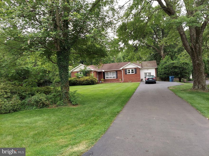 Value on lot and location! This half-acre lot is very spacious large enough for new construction or major renovation.  The lot is about 100 sq ft for building a new home for 60 ft wide and all utilities are available.   The renovation will give you a chance to redesign the entire house to enhance your dream home and investment values.  This charming two-story brick rambler is quietly located in the heart of Fairfax, close to the Fairfax County Government Center., Wegman, Walmart, Lowes, COSTCO, Homedepot, etc. Commuting is made easy with Routes 29, 50, 66, and only three miles to the Vienna metro station.    On the first level, it comes with 3 bedrooms with two full bathrooms and a modern kitchen with upgraded appliances, granite countertops, and a large double sink. The basement needs major renovation. The backyard is huge and great for children playing, gardening, and outdoor enjoyment. The neighborhood is friendly, quiet, and surrounded by many new homes. Make this your smart investment! Come see now!