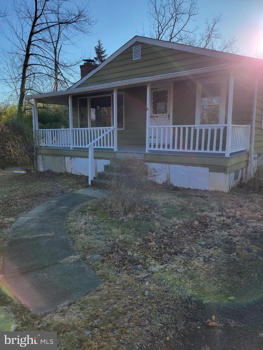 This is not a pet friendly property.  This adorable bungalow is in the country and will be beautiful with trees in bloom and the perennial gardens.  The home has been updated recently with vinyl plank flooring and new carpeting as well as new paint.  The character of this home still is intact with the original bathroom and features like arched entry ways.  Check out the doorbell on the back door that still is in working order!  There is a great front porch to enjoy as well as a small backyard.  Enter through the back door directly into the Kitchen where you will find a good sized eat in country kitchen.  From the kitchen, you will come into the large Dining Room that is convenient and leads into the oversized newly carpeted Living Room.  There is a decorative fireplace that looks great, but not operable.  Come back around and off of the Dining Room you will see the nice sized Bedroom that also has new carpeting.  The full bath is off of the kitchen.   This home is small but has everything you need.  There is a basement but it can be wet.  NO PETS!  Landlord is looking for all applicants over 18 to have no criminal background and a credit score of 600 or more. Landlord does a month to month lease.