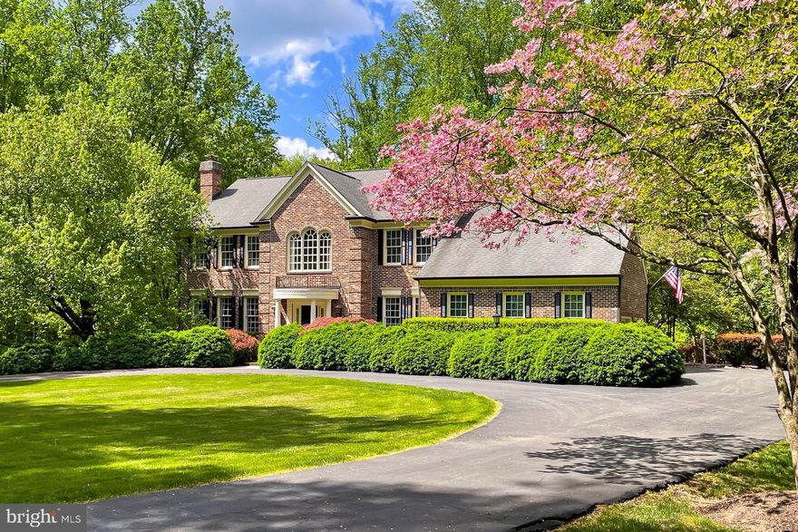 Welcome to 7808 Devereux Manor Ct., a stunning Brick and Siding 4 Bedroom  4.5 Bath home on 5 Professionally Designed and Maintained acres in the upscale Fairfax Station neighborhood of Devereux Station.
As you turn into the community, you first notice the street of well maintained estates.  The home at 7808 sits on a cul-de-sac among the manicured lawn, trees and shrubbery.  Once inside, you will find only the finest of upgrades, from the exquisite brass doorknobs on every door to the hardwood and tile flooring on the main and lower levels and the renovated baths throughout.
Enter the home through the recently renovated flagstone and red brick entrance with fiberglass columns,  wrought iron railing and a new Therma-Tru Front Door and Frame.
The main level includes hardwood flooring, family room with built-in book shelves and cabinets, gas fireplace with custom glass doors, plantation shutters, and walks out to the spacious deck.  The beautifully remodeled gourmet kitchen includes stainless appliances including new LG fridge(2025),G.E. gas cooktop, double wall oven, Kitchen Aid dishwasher, granite countertops, Burgess chandelier, custom cabinets, new bay window overlooking the pool and backyard, wine/beverage cooler,and tons of pantry space.
The separate laundry room has Italian tile flooring, custom storage cabinets, Electrolux washer/dryer, and deep fiberglass utility sink.  The powder room features marble flooring, new toilet, custom mirror with brass finish and new lighting. 
Living and Dining Rooms have custom rods and drapery, custom crown molding and archways.  The living room contains a second gas fireplace with custom glass doors and marble mantle.  The large office contains French glass doors, custom archway, and built-in bookshelves.  Custom made mirrors convey in the foyer, dining and living rooms.
The upper level features four bedrooms and 3 full baths with carpeting throughout. The large primary bedroom has 3 closets with shelving including a cedar closet with shoe shelving.  The primary bath has walk-in closet, shower with Italian tile, new glass shower door with brass handle, new shower head, double vanities, jacuzzi tub, custom mirrors,  kohler faucets, and plantation shutters. 
2nd, 3rd, and 4th bedrooms have custom rods/drapes and wide French door  double closets.  The 2nd bedroom has its own full bath with new shower door and shower head.  The 4th bedroom has a large bay window overlooking the stunning front yard.  All bedrooms have ceiling fans.  A full hall bath with double vanity completes the upper level.  ALL BATHS have Kohler French Gold faucets with granite countertops, custom mirrors and custom lighting.
The very spacious lower level features Italian tile flooring throughout, library/guest room with glass/French door and walk-in closet, exercise room, 2nd guest room, and Jack & Jill full bath. The amazing rec room features new Pella Doors/windows with built-in blinds, full wet bar with granite countertop, cabinets, fridge, gas fireplace and dropped ceiling with special mood lighting, ceiling fan and walks out to custom heated pool and Jacuzzi.  
The separate utility room contains a state of the art water filtration and softener system, high performance hot water tank, well pump with 40/60 pressure, sump pump and  recent HVAC 2 zone system.
The luxurious rear of the home is absolutely perfect for entertaining and family gatherings, with a full, 2 level deck, upgraded exterior lighting, custom heated mineral springs in- ground pool with jacuzzi, lighting system, recently replaced flagstone coping and flagstone patio decking. The pool has a brand new self cleaning water filtration system and pool cover. The oversized 2 car garage with high ceilings has 2 new Amarr insulated doors and 2 one half HP door openers.  The exterior also includes 6 inch custom gutters with special draining system directing water away from the home.