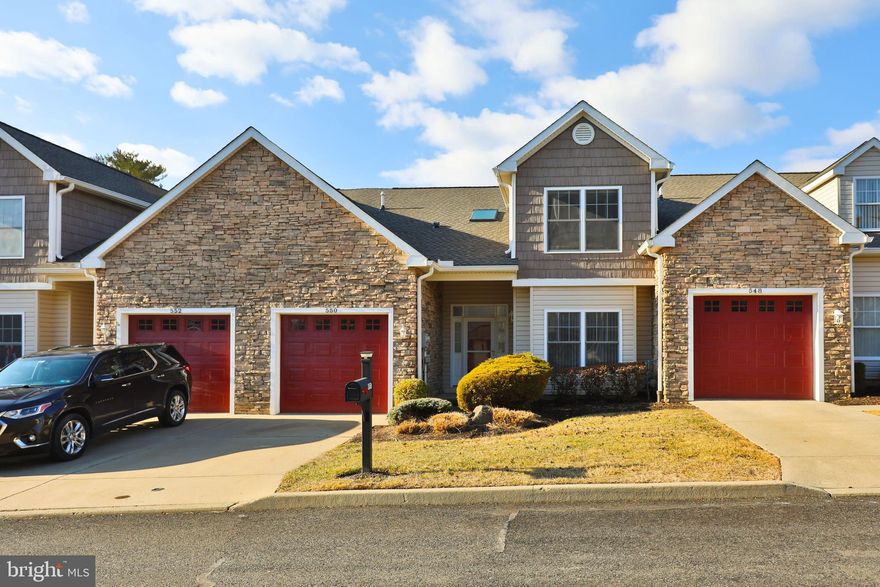 Welcome to easy living on Easy Street. The Villages at Pine Valley offers a monumental lifestyle for those looking to right-size in a 55+ community. This rare townhome offers garage and off street parking. These types of units are few and far between. With a lofted layout, there is plenty of natural lighting pouring into this unit. An open concept has the kitchen flowing into the great room with plenty of room to entertain. On the main floor there are 2 bedrooms and 2 full baths, laundry room and garage access. The second floor offers a spacious loft, possible 3rd bedroom that was previously being used as an Artist's retreat. The gated community has plenty of activities and an engaged social calendar. The Club-House has in-door swimming pool, exercise/fitness room, art studio, cozy fireplace library and plenty of room for entertaining. The club-house is key-fob secured and has plenty of parking.  Bring your finishing touches to this wonderful opportunity and enjoy the benefits of easy living at the Villages of Pine Valley. Call today for your private showing