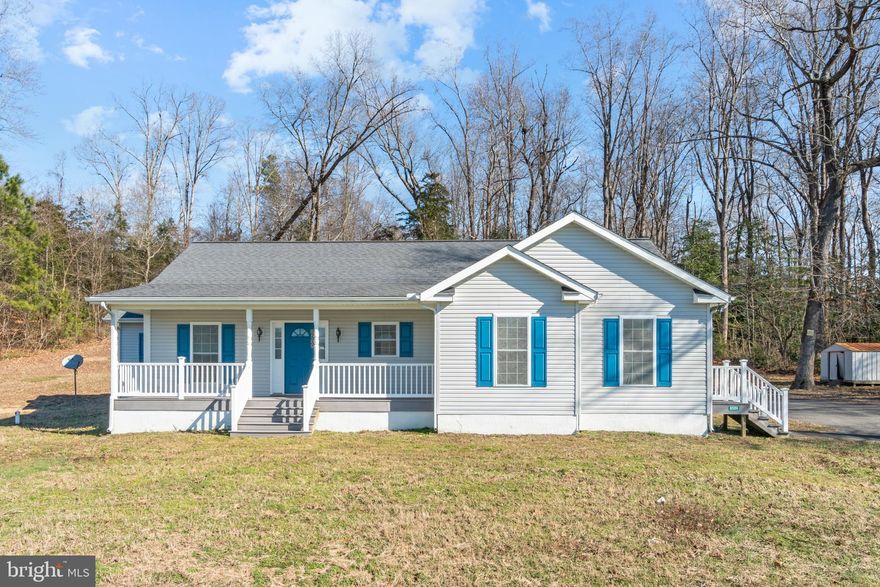 Welcome to the “Belle Vue”. As the name implies, this 1750 sq foot home was strategically placed on its’ 1-acre lot to create the feel of a natural, tranquil way of life, surrounded by nature with views of flat meadows and farmlands in the front and majestic oaks, maples and hollies on the back and sides, visible from the “all glass” sunroom. Belle Vue is only minutes away from modern conveniences and the nostalgic comfort of Kilmarnock, Virginia. If you and your family enjoy open spaces, outdoors and nature, then this home has it all.  As part of the Heritage Point neighborhood, you will have access to the amenities of the Heritage Point Marina, boat ramp, Clubhouse and Swimming Pool. The private boat ramp gives you direct access to the Corrotoman River and multiple Public Landings to the Rappahannock River are minutes away, including beautiful Belle Isle State Park where there is ample camping, hiking, fishing, canoeing and kayaking for the entire family.  
For those days that demand peace and tranquility, simply call a timeout on the rear 10 x 13 all glass enclosed sunroom. Enjoy your favorite cup of coffee first thing in the morning or enjoy a nightcap in the evening while you replay the events of the day. When you crave to bathe in the glory and warmth of the morning sun, relocate to the 28 x 6 front porch, constructed of durable composite decking. Enjoy the Eagles and Hawks on their morning travels and spy the deer as they graze in the farm fields. 
To match the exterior open space, the interior is just as grand, with arched doorways,  a very accommodating Owner’s suite, and 2 additional bedrooms.  Belle Vue provides charm, appeal and elegance with its’ granite-faced, caddy-corner gas fireplace, visible from the kitchen and all angles of the great room.  
Belle Vue has recently undergone a beautification transformation. The home was recently updated with all new Stainless Steel Samsung appliances for a fresh and modern look, as well as a new oversized hot water heater for the latest in energy efficient operations.  The Owner’s suite received a new fan and lighting, carpet, replacement windows, and fresh paint.  The spacious Owner’s Bathroom includes a his and hers double sink vanity constructed of cultured marble, a relaxing soaker tub, a large 4 x 4 shower and new toilet. All faucets are by Moen.  
Every room of the home received fresh paint.  Sherwin Williams “SuperPaint” in Eggshell texture for lasting quality and color retention was applied to all walls, while Sherwin Williams ProMar was applied to the ceilings.  All interior and exterior doors and shutters received vibrant, durable paint to last for years.  New textured carpet for comfort, style and durability was installed in all the main rooms. The owners left no stone unturned; they even replaced the exterior doors’ weather seals to keep the warm air in and the cold out.      
The great room received a new fan and lighting, while the kitchen is bright and open, accentuated by recessed lighting with a side desk and island for easy and convenient meal management or entertainment.