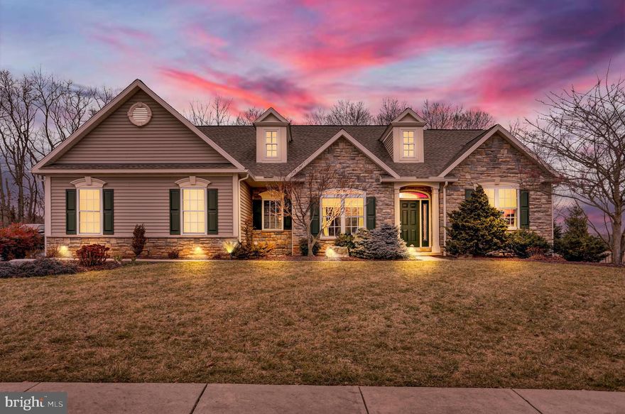 This is a stunning, ranch home with a side entry 2 car garage located on a premier lot within the Green Valley Estates community and Wilson School District. Upon entering the home, you will immediately be wowed by the open floor plan including the expansive tiled foyer, arched doorways, and vaulted and tray ceilings. The great room features rich hardwood flooring, a gas fireplace with built in entertainment storage, and a vaulted ceiling with skylights. Next to and open to the great room is the well appointed kitchen. The kitchen boasts tile flooring, solid wood cabinetry with tile backsplash, granite countertops, stainless steel appliances, pantry, eating bar, and a dining area that leads to the covered deck with ceiling fan. The formal dining room with tray ceiling has been converted to a home office with hardwood flooring, built in cabinetry, and french pocket doors. To the left of the foyer is a hallway leading to the main floor laundry and secluded master suite, complete with vaulted ceiling, walk in closet, and a luxurious en suite bathroom complemented by a custom tiled, walk in shower and a double bowl vanity featuring recessed mirrors set in a tile backsplash. On the opposite end of the home, there are 2 additional bedrooms with large closets and a 2nd full bathroom. From the foyer, you can also access the partially finished, walkout lower level complete with 2 very spacious recreational rooms, 4th bedroom, 3rd full bathroom, and 2 large storage rooms. The rec room has double doors that lead to the stamped concrete patio that extends the width of the home and your own beautiful inground salt water pool. While enjoying the outdoor features, you will also have the pleasure of looking at nothing beyond your home other than greenery and open fields behind your fenced rear yard. Come take a look, fall in love, and make this spectacular home your home.