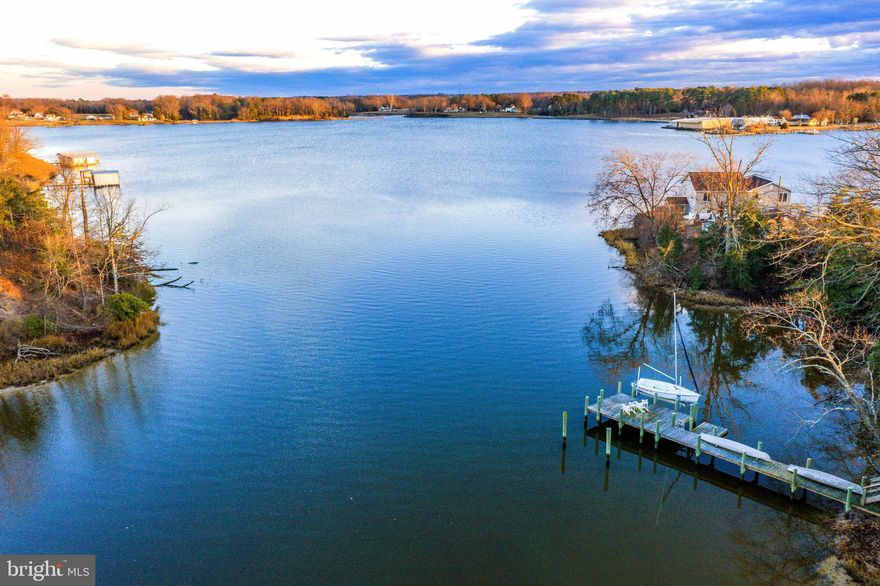Welcome to this stunning waterfront home on Nomini Creek in Montross, VA! This property includes three tax parcels which total 4.88 +/- acres. Upon entering the home, you are greeted by an open living room, dining room & kitchen. Floor-to-ceiling windows in the living room face southeast, letting you experience glorious sunrises every morning and provides plenty of natural light throughout the day. To the left of the living room and down the hallway, you’ll find the first-floor owner’s suite complete with a walk-in closet and private deck access. That hallway also leads to a small front porch, an ideal spot for watching the unique colors & clouds of the sunsets.  Head upstairs and you’ll find a nice sized loft area, as well as two spacious bedrooms and a full bath. Bird lovers, just sit on the back deck and enjoy – the area is a playground for Eagles, osprey, & hummingbirds. Make your way down the steps to your very own private pier complete with a boat lift. Love steamed crabs? Catch them right off your pier and steam them on the deck! Adjacent to the main home is a huge 2-story outbuilding. The top floor is complete with a kitchen, full bath, heat & AC - perfect for a home office or Airbnb. Less than 2 hours away from Northern Virginia and Richmond, make this home your little haven and enjoy the tranquility of Nomini Creek! THIS PROPERTY IS SCHEDULED FOR AN ACCELERATED SALE. THE LISTING PRICE IS NOT THE SELLING PRICE, BUT THE OPENING BID AT THE ACCELERATED SALE. This property can be sold prior to the date of the Accelerated Sale with an offer that is acceptable to the Seller.