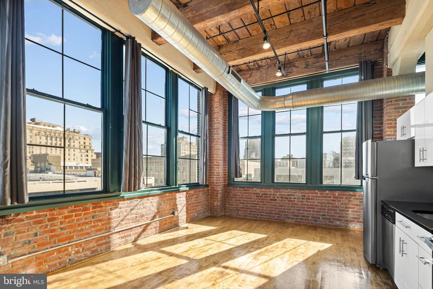 PRICE IMPROVED!!
Stunning Loft-Style Condo in the Heart of the City .  You don't get more natural light than this!!!

Welcome to this beautifully updated one-bedroom corner, loft-style condo featuring industrial charm, modern elegance and a BALCONY!  Located in a prime urban setting, this unique residence offers soaring ceilings, exposed brick walls, and oversized windows that fill the space with natural light.

The brand-new kitchen boasts sleek cabinetry, stainless steel appliances, and modern finishes, perfect for cooking and entertaining. Freshly refinished hardwood floors enhance the unit’s warmth, while an open floor plan creates a spacious and inviting atmosphere. Step out onto your private balcony and enjoy city views, the perfect spot for morning coffee or evening relaxation.

Situated at 1010 Arch St, you're just moments from top dining, shopping, and entertainment, with easy access to public transportation. The concierge front desk will deliver packages to your doorstep, and on-site maintenance is there to help. Don’t miss this opportunity to own a stylish urban retreat!