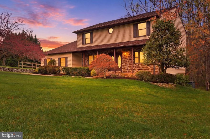 Set on over an acre of private land, this 4-bedroom, 2.5-bath colonial offers classic charm. The main level features a bright office, a wood-burning fireplace, a kitchen with stainless steel appliances, a dining room, 2 living room spaces, and a convenient laundry room. Upstairs, the primary suite includes a walk-in closet and en-suite bath, with three additional bedrooms for flexibility. The basement is HUGE and unfinished for endless possibilities. Outside, the large deck is ideal for relaxing or entertaining. With a new septic system and generator, this home is move-in ready for year-round comfort.