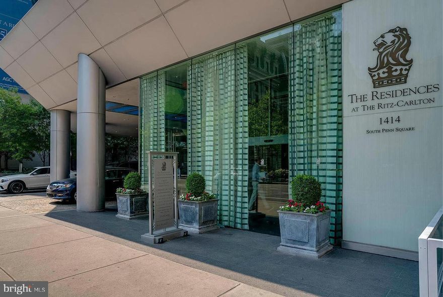 This beautifully upgraded and meticulously maintained home is your sanctuary in the heart of the City. Floor-to-ceiling operable windows fill the space with natural light while framing the city’s iconic City Hall and offer a perfect view of Dilworth Park. 
The gourmet kitchen features sleek European Oak cabinetry, Kashmir white countertops, and premium appliances, including a Viking gas range and convection microwave, Sub-Zero refrigerator, and Miele dishwasher.
The spacious bedroom easily accommodates a king-sized bed and offers custom closet, all while providing stunning views of City Hall. The luxurious ensuite bath is a true spa-like retreat, adorned with Calacatta Gold marble, a double vanity, an oversized glass-enclosed shower, and a Bain ultra-soaking tub for the ultimate relaxation experience. Uniquely for a 1-bedroom home, there is also a guest powder room—a rare and highly desirable feature—along with a laundry closet equipped with a Asko stackable washer and dryer.
The best of luxury living awaits you, with the world-class Ritz-Carlton services and resident-only amenities. These include 24-hour concierge; porters, chauffeur service, a state-of-the-art fitness center, an indoor lap pool, hot tub, and locker rooms with showers, and a private yoga room. The resident lounge is perfect for daily use or private events at no additional cost. Additional amenities include a theater room, a newly renovated outdoor terrace with grills, dining areas, fire pits, and lounge seating, an on-site dog park, and a gated garden with direct access to The Ritz-Carlton Hotel.