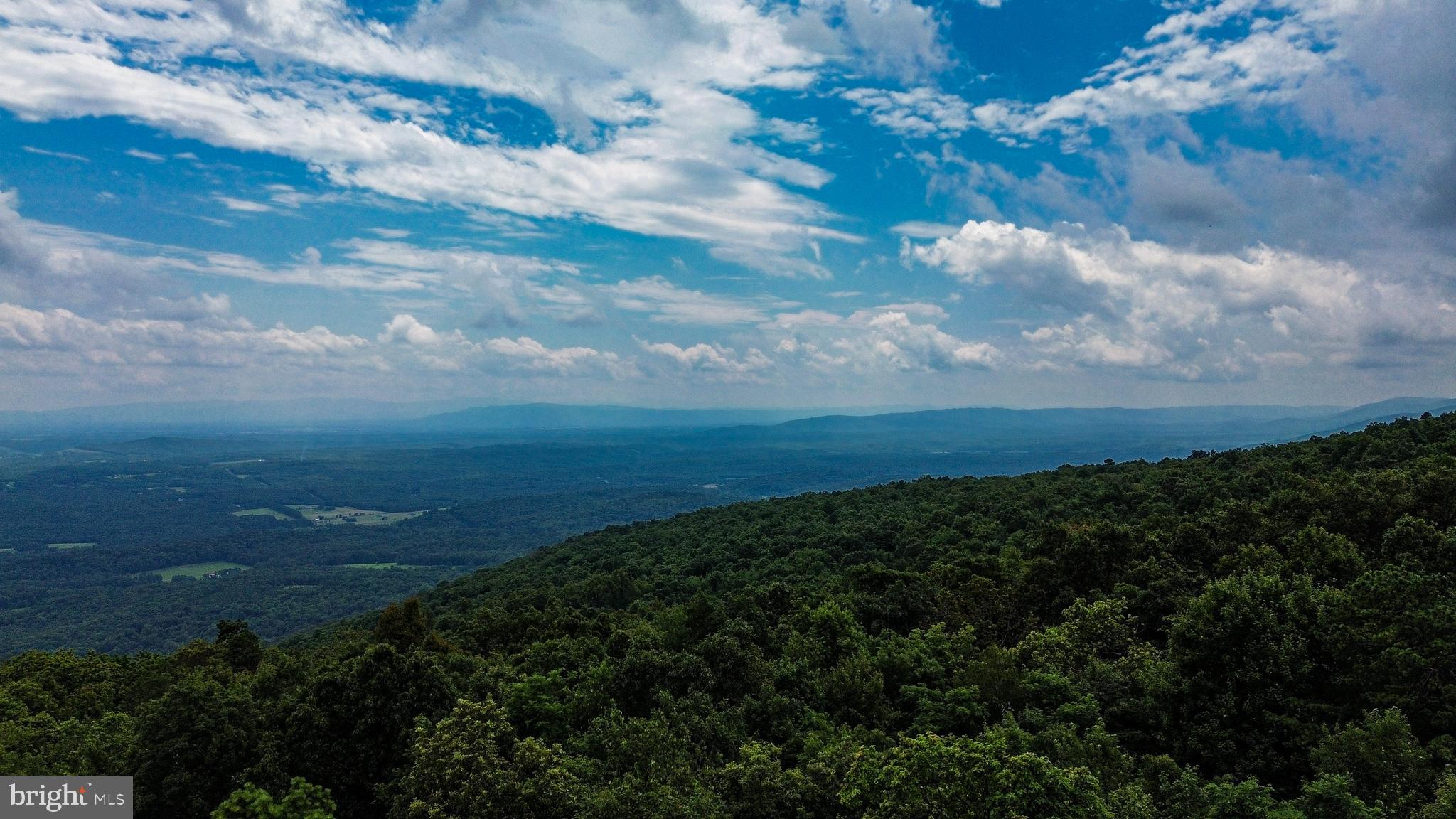 WOW! Opportunities like this DO NOT come up often!! This sale includes THREE lots on the premium "view side" of Rockwood Trail, totaling nearly 1.4 acres (estimated). Go take a look and see the view potential on these lots. It's going to make you swoon!! Imagine the possibilities and schedule your showing today!
Note: Buyer should consult Frederick County Planning Department and the VA Department of Health for building restrictions. Shawneeland is managed as a Sanitary District by Frederick County.