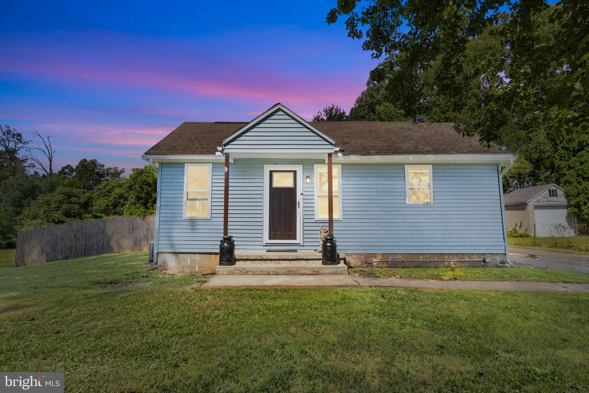 Discover comfort and character in this cozy two-bedroom, one-bath home perfectly set on almost an acre of land. Offering a warm and inviting feel, this property blends privacy with plenty of outdoor space to enjoy. Two versatile outbuildings provide endless possibilities—ideal for storage, hobbies, a workshop, or even a home office. Whether you’re looking for a peaceful retreat or a property with room to grow, this charming home delivers.