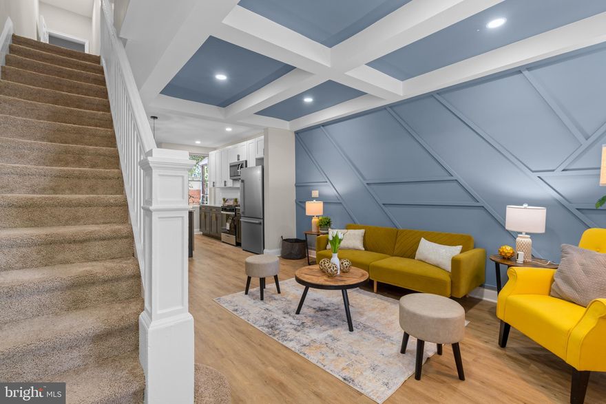 BRING ALL OFFERS! Walk to Coppin for college! Great potential rental investment.  Explore this enticing 4-bedroom, 2.5-bathroom home located just minutes away from Hanlon Park and shopping. Recently renovated from top to bottom, this residence boasts a welcoming open floor plan, adorned with a decorative panel wall, an impressive coffered ceiling, luxurious vinyl plank flooring, a sizable kitchen island, and stainless steel kitchen appliances. Featuring modern finishes and generously proportioned rooms, this home is sure to captivate friends and family during special occasions and gatherings. Seize the chance to own this budget-friendly and stunning home.