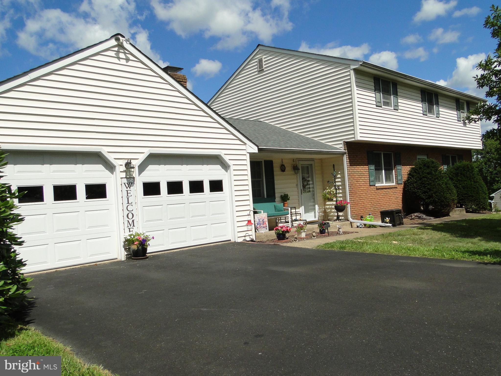 Welcome to this spacious 4 bedroom, 2.5 bath colonial on 1.5 acres in Quakertown School
District. Featuring a thoughtfully designed layout, this home offers comfort, functionality and a
terrific location on a cul-de-sac street in sought after Milford Twp. As you step inside you will
find a bright and cheerful home featuring a large eat-in kitchen with plenty of cabinets and
counter space, plus a formal dining room with beautiful hardwood floors and crown molding.
Large bright living room with gleaming hardwood floors with sliding doors leading to a huge
covered 2 tiered deck with skylights. The large family room off the kitchen offers a brick fireplace
for those cool winter nights, 1st floor laundry area, powder room and access to a large
oversized 2 car attached garage with 2 openers. The second floor consists of a large primary
bedroom with bath, plus 3 other generous sized bedrooms and hall bath. Full basement with
outside exit includes a free standing propane heater, whole house central vac system and
plenty of extra storage. Outside you will find a large 24x18 two tiered deck with skylights,
above ground swimming pool, large shed and beautiful views of the 1.5 acres. This area is
spectacular for entertaining friends or just relaxing and reading a good book. Located on a quiet
street and convenient to parks, school, restaurants, shopping and the PA Turnpike. Mature
landscaping and a newer roof in 2021. A must see home! Call for your appointment now!