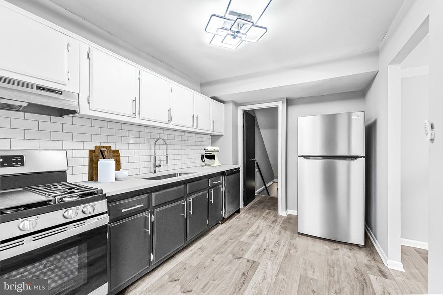 Priced To Sell Fast! Hot Updated 3 Level Brick Front Townhouse, Spacious Kitchen with QUARTZ Counters, Stainless Steel Appliances, Spacious Bedrooms, New Custom Paint, Updated Bathrooms, New Flooring, New Lighting, Fenced Backyard, Walkout Finished Basement, Much More!! Close to Schools, Shopping, and Commuter Routes. This Will Not Last!