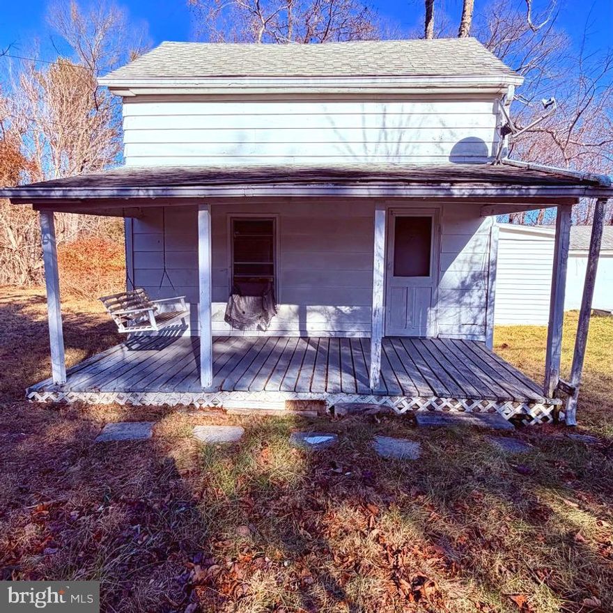 Prime Investment or Visionary Build Opportunity – Cash Offers Only
Unlock the potential of this 1.23-acre lot in a sought-after location ideal for investors or buyers with vision. Whether you pursue a full renovation or a complete tear-down and new construction, this property offers an excellent opportunity.
The existing home and outbuildings are being sold strictly as-is; all debris will remain on site. Enter at your own risk. Electric is off, and the property will not qualify for financing; cash offers only. An existing well and septic system are in place (condition unknown).
A small stream runs along the rear of the property, enhancing the natural setting and long-term appeal. With its generous lot size, desirable location, and unique landscape, this is a rare chance to create something truly special.  Please be courteous to the neighbor and do not park in their driveway while looking at the property.  The driveway gate is unlocked.