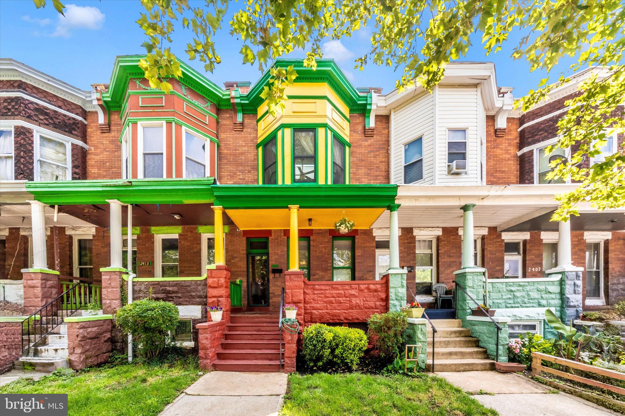 **Welcome to this truly unique 3 Bedroom, 1.5 Bathroom Guilford Avenue "Painted Lady," a gem nestled on a beautiful, tree-lined street that bridges the charm of four iconic neighborhoods: Charles Village, Charles North, Barclay, and Old Goucher. This home exudes character at every turn, with ornate woodwork that graces the grand staircase and solid hardwood pocket doors that elegantly separate the formal living and dining rooms. The kitchen has been tastefully updated with new cabinets, countertop and backsplash but retains a piece of history with its rare, original icebox, complemented by an exposed brick wall that adds warmth and texture.
Step outside to enjoy one of the three inviting porches, or retreat to one of the large bedrooms, two of which feature the original built-in armoires for ample storage. The primary bedroom offers a cozy seating nook, skylight and large walk-in closet. The home’s main level impresses with soaring 12' ceilings, while the living room's working wood-burning stove and crystal doorknobs throughout add to the home’s timeless appeal. Original wood windows complete the picture of this exceptional property. Don’t miss the opportunity to own a piece of history in one of the city’s most vibrant areas. Home is located in the Charles Village Community Benefits District and is subject to an additional $206.25 tax per year (approximately). This tax is for neighborhood beautification, cleaning and other services. Eligible for the JHU "Live Near Your Work" Grant of up to $17,000.