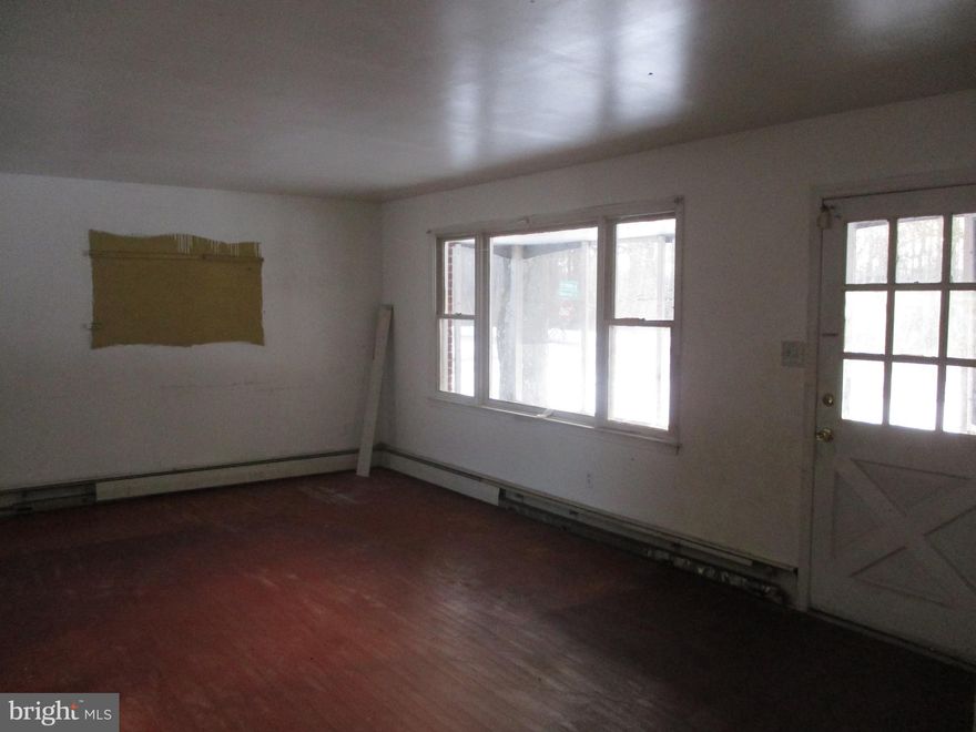 Brick rancher on half acre corner lot!  Three bedroom home with large shed, enclosed porch, and  full basement.  Close to Rt 40 for easy access to work, shopping and entertainment. Purchasers may use any lender they choose to finance the purchase of a property.  Any offers on this property require a minimum Earnest Money Deposit of 1% of the Purchase Price or $1,000, whichever is greater. All initial offers must be submitted via PropOffers site by the BUYER AGENT ONLY.