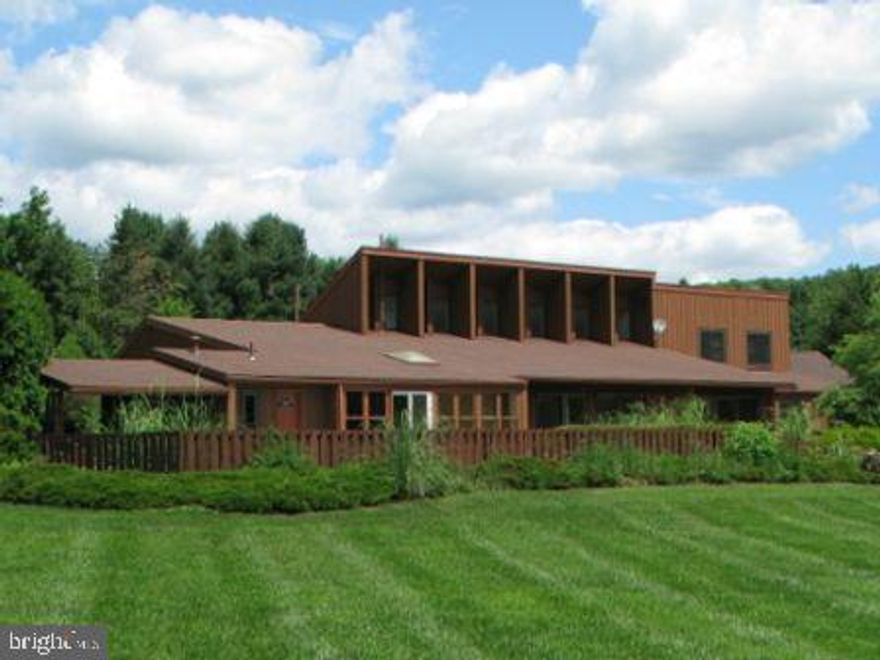 Surrounded by beauty year round, this extraordinary California contemporary home is situated on a 2-acre park-like setting on the 13th hole of Willow Hollow Golf Course. Views can be taken in from the solid 75 foot deck, sunken deck or pool patio. Come home to a private getaway spot yet convenient access to 183 Bernville Pike, 222/422. Less than 10 minutes from town, and shopping of every kind, including the Broadcasting Shopping Center and Bershire Mall.. Features high ceilings and 3,864 sq ft of living space. Save on utilities with whole house heated floors, electric appliances,  . Three bedrooms on main floor and a fourth bedroom that can become a home office. Spend leisure time in the Sylvan pool, Jacuzzi, or the 4-season room. This is a must see! Pool House - Barbecue area - Cable Ready - Ceiling Fans - Deck - Dbl Pane Storm Windows & doors - Fenced Yard - Storage - Skylights - Carpet - Garden - Lawn -, Garage, 2 Off St. spaces - Patio - Porch - Vaulted Ceiling