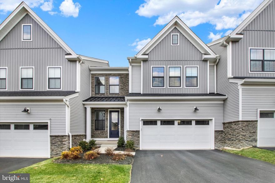 Welcome to Toll Brothers’ Doylestown Walk. This almost-new home-only 1 year old-features the Derby model with a two-story foyer leading to an expansive great room and a gourmet kitchen with large island, stainless steel appliances, and walk-in pantry. This bright and beautifully situated homesite offers a spacious deck and long distance views.
The home includes a large walk-out basement, providing an excellent opportunity to create a gym, entertainment area, home office, or additional living space and rough bath plumb.
The second floor offers a private loft, a spacious primary bedroom suite with luxurious bath and oversized walk-in closet, two additional bedrooms (one with a large walk-in closet), and a full hall bath. A laundry room is conveniently located on the second floor.
This home is in a great location with easy access to Doylestown Borough, as well as major highways to Philadelphia, New Jersey, and the PA Turnpike.