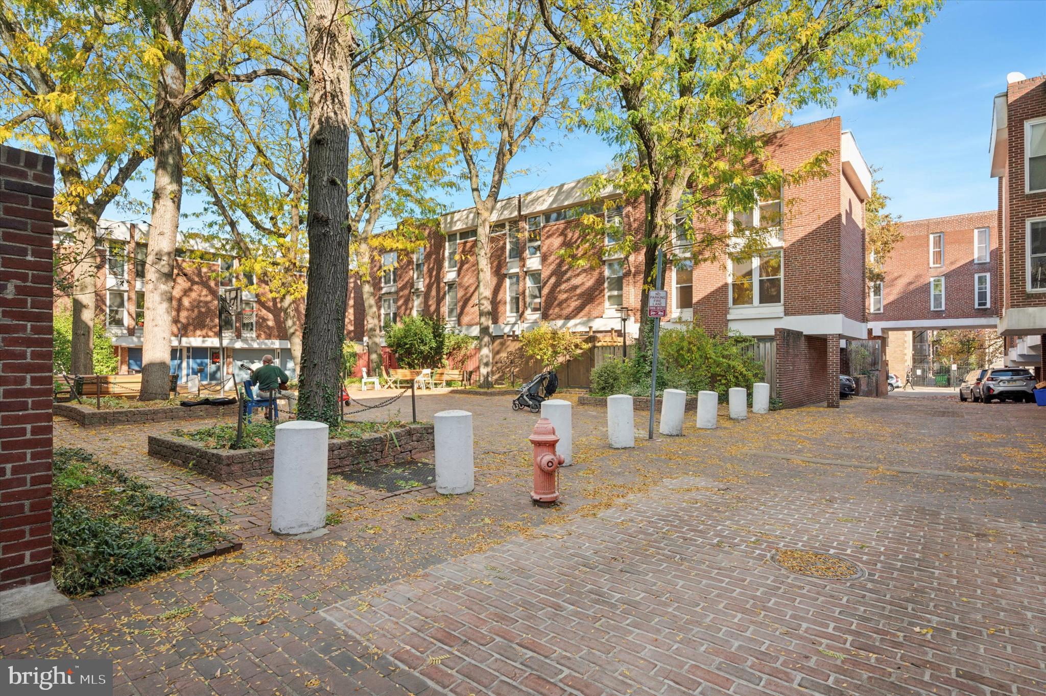 Welcome to University Mews, a distinctive residential community in the heart of University City, Philadelphia. This charming 3-bedroom, 1.5-bath home offers both a one car garage and an additional space in driveway, making urban living convenient. University Mews is a community featuring 47 contemporary homes arranged around a peaceful private courtyard, creating a strong sense of community and a tranquil environment. This home is situated near the center of the community and is just steps from the popular courtyard. In walking distance from the University of Pennsylvania and Drexel University, it’s the ideal spot for those seeking proximity to campus life. Parents will appreciate being in the highly sought-after Penn Alexander School catchment, a top-rated K-8 public school. The home’s modern architectural style blends seamlessly into its vibrant, urban surroundings, while the shared courtyard provides a communal space for relaxation and socializing. This home embodies the perfect mix of private living and community, all in a prime university area location. Don’t miss out on this highly desirable property in University City and make this house your home! Homes for sale in this urban community don't come up often so schedule your showing today!