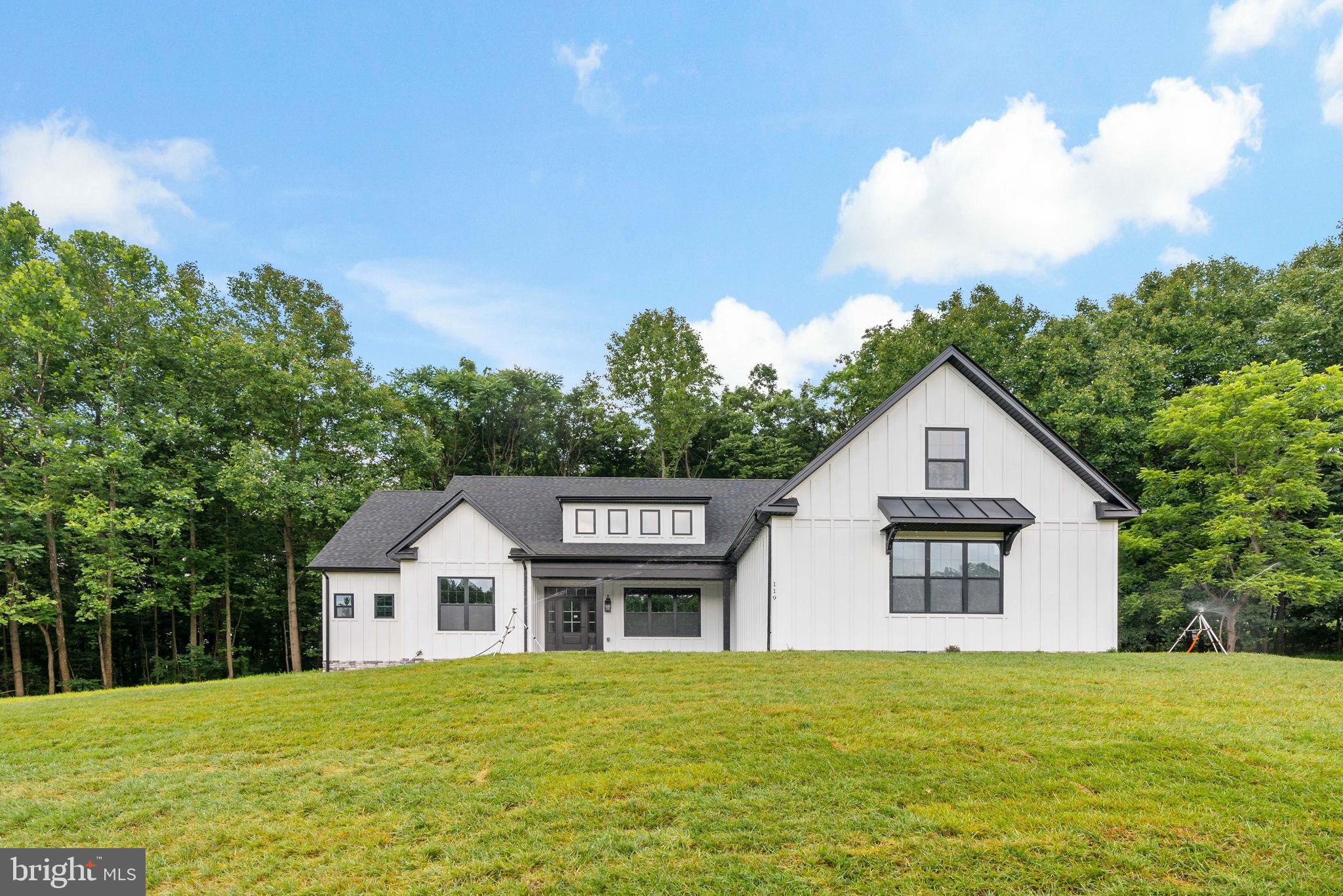 REDUCED! Construction is complete on your brand new home! 5.33 ACRE partially wooded lot located in -Crossings On The Potomac, a Gated Community (property extends beyond the gate) conveniently located within a few minutes of the Maryland State Line and I-81, and still offers a secluded setting. Community offers Deep Water Potomac River Access, Community Dock, Boat Ramp, Paved Roads, and Underground Utilities for your new home. This well established community no doubt is sought after. Your home will fit in perfectly and will include the following: 4 bedrooms with 4.5 baths for the ranch craftsman style home. Quality construction with nicely upgraded full kitchen appliance package, granite or upgraded quartz counters , luxury vinyl plank flooring, carpet, soft close cabinets, vaulted ceilings & so much more. Full unfinished basement. Close to amenities. Pictures are of similar construction and various upgraded finishes and appliance package.