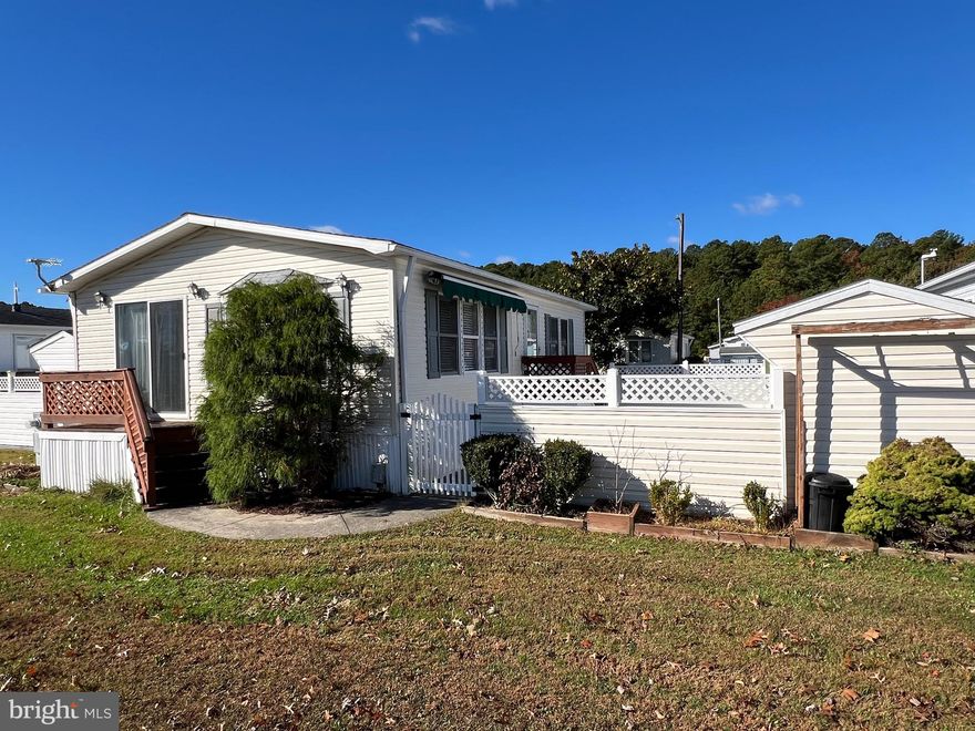 Spacious  Fully Furnished 2 Bedroom Cottage Overlooking Rec. Center Pool.  LVP Flooring, Granite Countertops,  Drywall Interior, Cathedral Ceiling , Skylights,Bow Window in Dining Area.  Gas Stove, Dishwasher, Built in Microwave, Stack Washer/Dryer , Enclosed Courtyard  with Retractable Awning.  8 x 10 Shed.