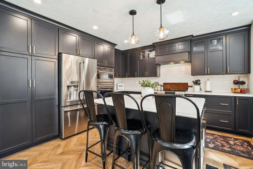 Open House Sunday April 13th 11-1, Don't miss this stunning move in ready home that shows like a model!!  3 finished levels, main level boasts herringbone wood floors and a Chefs kitchen that has all GE Cafe appliances, quartz counters and an island with seating for guest to join the Chef.   A gas fireplace in the great room with built in cabinetry makes for a cozy living space.   Formal Dining room and Private office makes a great space for those working from home. The just completed 12' x 30' maintenance free deck provides a great outdoor entertainment space with steps leading to the private fully fenced back yard. The walk out on the lower level allows for a bright living space.  Primary suite with walk in closet and full bath with a soaking tub, separate shower and double vanity. 2 additional generously sized bedrooms complete the upper level.  You will not want to miss this home!