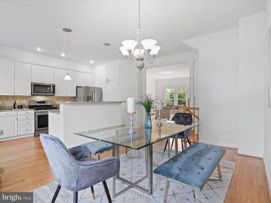 ***OPEN HOUSE ON SUNDAY, JUNE 9TH, 2024 IS CANCELED*** Offers due by 2pm Sunday, June 9th, 2024. Presenting this beautifully maintained, freshly painted and updated private End Unit 3BR / 2BA / 2 1/2 BA 2,284 Sq. Ft. Three Level Townhome with Oversized One Car Garage, centrally located in the desirable and   amenity rich South Riding community!  Upon entry to home, you are met with hardwood flooring foyer with powder room and coat closet that leads directly to an open concept living room, dining room and kitchen floorplan. Living room with extended crown molding overlooks total privacy in front of the home and has recently refinished hardwood flooring throughout.  Dining Room flows into the kitchen that features 42 inch white cabinets, granite counters, breakfast bar, stainless appliances, custom tile backsplash, pantry, extra shelves over breakfront cabinet for extra storage and recessed lighting, also with refinished hardwood floors. Off kitchen is a huge maintenance free Trex Deck, perfect for morning coffee, exterior entertaining and it overlooks huge empty side lot and woods that both provide even more privacy. Windows line the staircase leading upstairs for extra light and upstairs includes three well sized bedrooms all with new carpet, including the primary bedroom with vaulted ceilings, ceiling fan, step-in primary closet and updated en-suite primary bathroom that includes tile flooring, dual vanities and stand-in shower with tile and glass door. Second bedrooms are generously sized secondary rooms and share a second renovated full bathroom with tile flooring, dual vanities and soaking tub/shower combination with tile. Basement is 3/4 finished and includes additional living room space with laminate flooring, gas log fireplace, storage room with 2022 Carrier Infinity Furnace and 2014 Water Heater. Basement also includes another half bathroom, separate dedicated laundry room with Maytag Washer/Dryer combo and storage, another additional enclosed storage room and access to the freshly landscaped and spacious fenced backyard with ground level patio for additional entertaining space.  Roof was replaced in 2017 and Windows have been replaced.  Garage is oversized and provides extra storage past where you can park the car, with concrete driveway for extra parking.  The townhouse is also located across from open street parking, which is rare for the area and neighborhood.  It is also located less than 1 mile to the main South Riding Clubhouse, park and pool for summer outdoor movies and outdoor entertainment.  For restaurants and retail, the Triveni Supermarket Shopping Center that includes Duck Donuts, Starbucks, Sweet Frog, South Riding Inn, Domino's and other retail and restaurant choices is less than 1/4 mile away. Giant, Walmart Super Center and Harris Teeter Shopping Centers are three other nearby shopping center locations for grocery, coffee, restaurants, retail and hardware.  For transportation, the home resides near Tall Cedars Parkway and Little River Turnpike (Route 50) for commuting purposes and there is a bus stop with parking within two miles that will take you to the nearest metro stop. Both Stone Springs Hospital and Inova Urgent Care are also nearby.  Finally, enjoy the Fireworks this 4th of July, set off from the nearby community golf course.  This spacious townhome both on the inside and outside is in a prime location in South Riding at a hard to find price for the area, do not miss it!