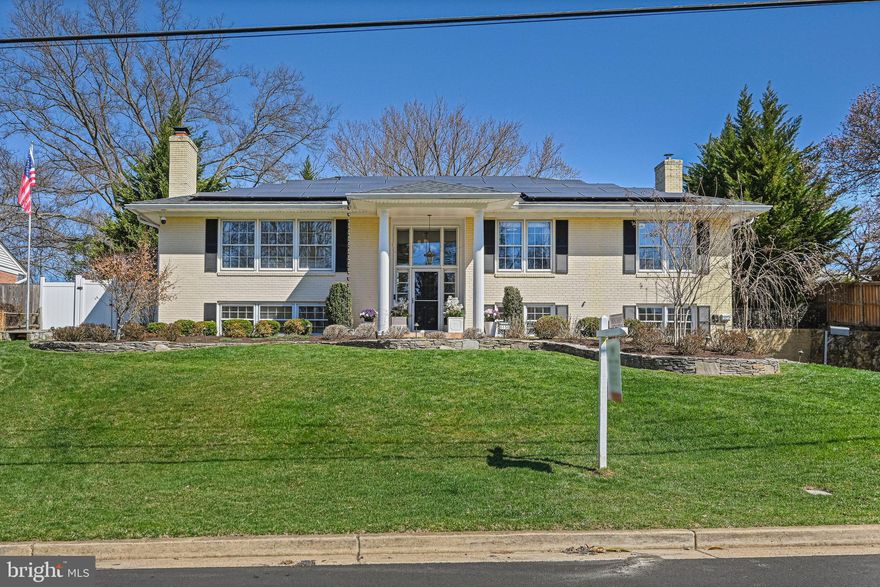 Introducing 6156 Loch Raven Dr, McLean, VA – A Harmonious Blend of Modern Luxury and Entertainment. Nestled in the highly desirable Potomac Hills community, this beautifully updated 4-bedroom, 3-bathroom home with an amazing backyard pool combines style and function, with a vacation feel. The home features hardwood floors throughout and a sleek, updated gourmet kitchen with granite countertops, perfect for modern living. The open-concept kitchen, dining, and living spaces create a welcoming, flowing environment, while built-in shelves and a wood-burning fireplace add a cozy touch. The main level includes 3 of the 4 bedrooms, highlighted by the primary suite with an ensuite bath featuring heated floors for added comfort. Additional luxurious touches include a steam shower and heated floors in the downstairs bathroom. The personalized 2-car garage doubles as a Craftsman’s workshop, ideal for winter projects or hobby work. The lower level adds even more value with a 4th bedroom and a 3rd full bath. The recreation room, complete with a second wood-burning fireplace, offers a cozy space for relaxation and entertaining.  Outside the home, is an entertainer’s dream. The expansive backyard boasts a striking 11.5 ft deep pool with a diving board, complemented by a fully equipped outdoor bar perfect for hosting. An outdoor TV and surround sound system with speakers set the stage for unforgettable gatherings. With complete privacy provided by the surrounding evergreens and the elevated lot’s natural protection, the backyard is a serene oasis. The Potomac Hills community is celebrated for its welcoming, neighborly atmosphere, offering a sense of connection and is super convenient to Washington DC, Tysons, downtown McLean, Falls Church, the Beltway, and GW Parkway. This home perfectly balances luxurious living and outdoor entertainment in a peaceful, vibrant neighborhood. Come live the good life.