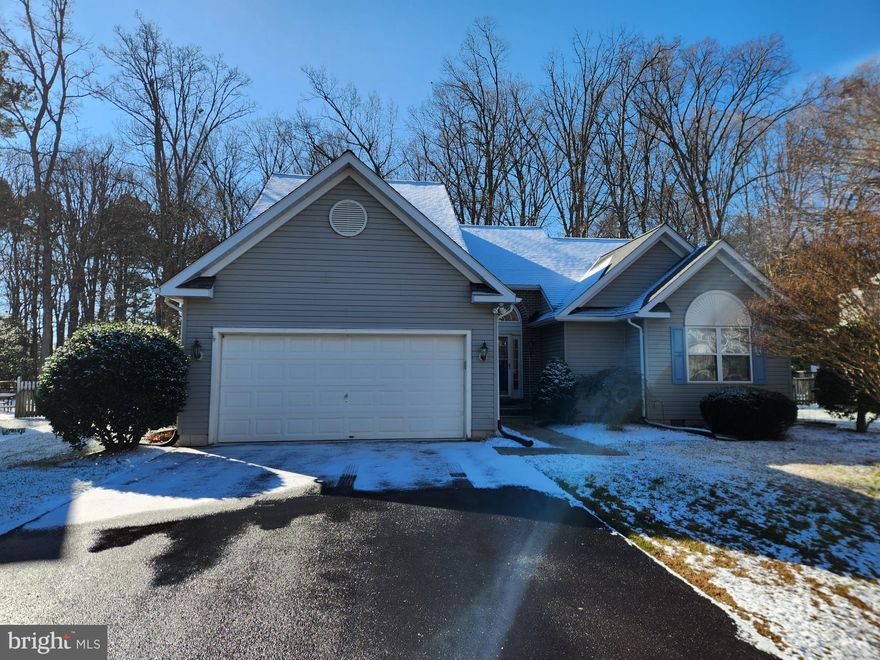 Warm, comfy and ready to go! Might be the best way to describe the feel of this lovely 3 bedroom, 2-1/2 bath home in the terrific and  convenient Claybourne Woods community. The "new" includes a brand new roof, kitchen cabinets, granite kitchen counters, kitchen sink and faucet, wood floors downstairs and main level carpeting. The rest of the home is move-in ready and was just professionally cleaned. The main bedroom suite is on the first floor and opens into the great room with its soaring ceilings and large windows. Just off the great room is a large multipurpose room that would make a nice home theater, home office or home gym! The new kitchen connects to the dining area and opens onto an enormous screen porch and deck- perfect for outdoor entertaining!! The remaining two bedrooms and full bath are at the top of a dramatic stairway. One of the best lots in the community.  Come check out this beauty before it gets snapped up! Quick access to all shopping , restaurants and schools.