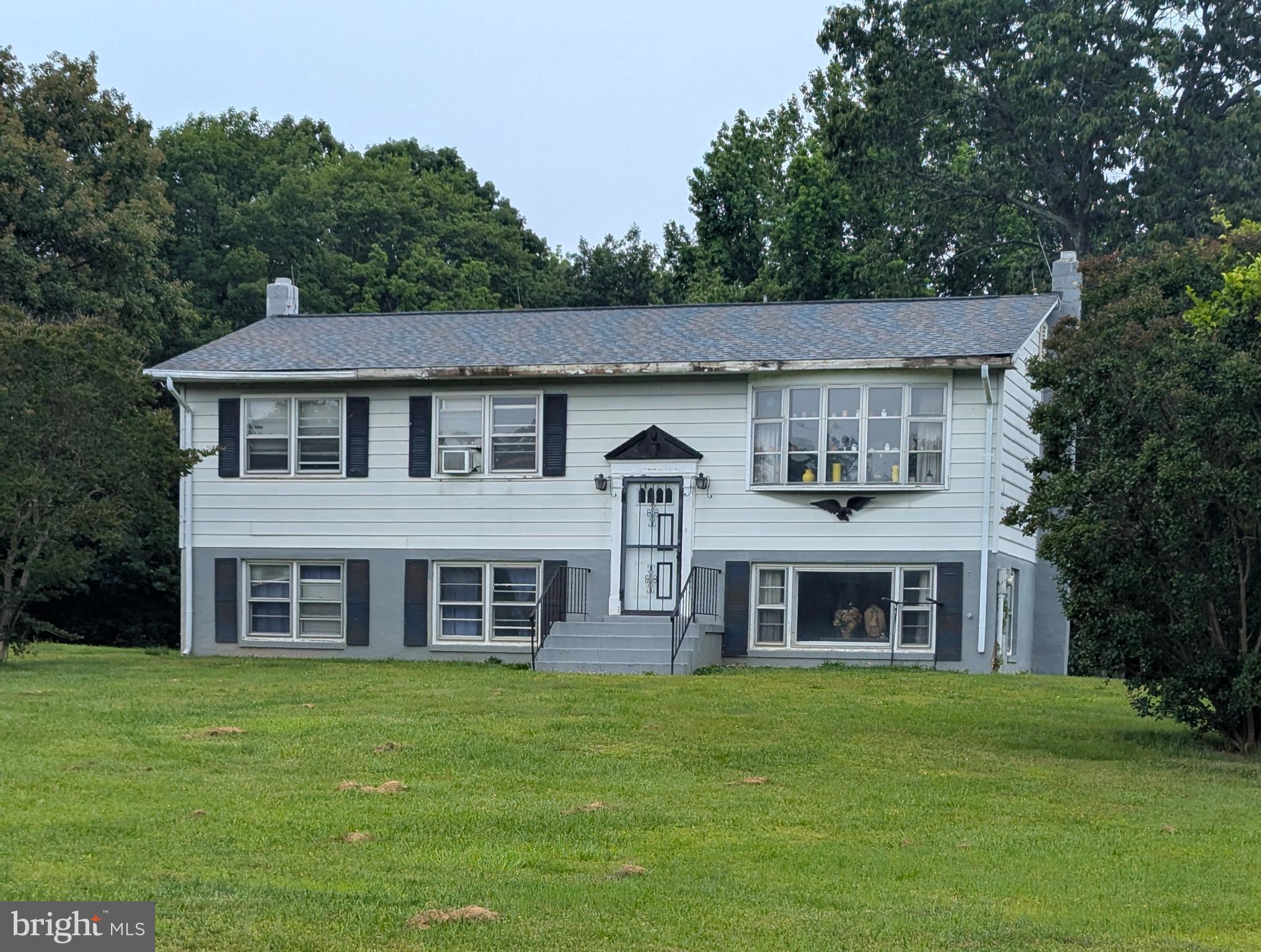 Four level Split Foyer on six acres needs work. Three main level bedrooms with a full bathroom. Lower level bedroom with a half bathroom, bonus room and laundry room. The list price is based on the June 2025 appraisal.