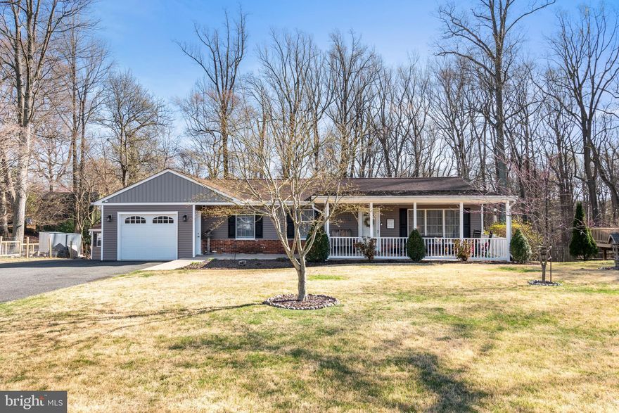 If you love nature, you will love this property it backs up to the woods, very county like setting, the front of the house views is farmland. Great views no matter where you sit. Comfortable Rancher with a large driveway, inviting front porch to relax with views of the farm. On the main level the home offers 3 bedrooms, two full baths, living room with the kitchen and dining room opened plan. On the lower level, wet bar, family room, full bathroom, laundry room, possibly 4th bedroom, office, exercise or a playroom with a pellet stove. Huge deck off of the kitchen overlooking the woods. Gargage has heat and electric, shed in the backyard, storage/workroom under garage with heat and electric. This home offers so much a must see.