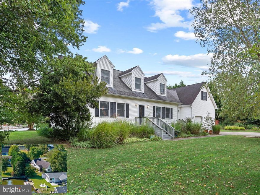 Introducing 13374 Cove Landing Rd.—a canal-front opportunity in the desirable Bayview Estates community, offering private dock access and exceptional coastal potential. While this home carries a Bishopville, MD address, it is located within Bayview Estates and accessed through the Delaware side of the community, offering the convenience of coastal Maryland and Delaware living. Nestled on nearly a half-acre corner lot, this waterfront retreat provides tranquil canal-front living with a private dock. Due to seasonal tides, the dock is best suited for launching smaller craft or short-term tie-ups, while the nearby community boat ramp provides convenient access for larger vessels. From here, enjoy boating through Grey’s Creek to Assawoman Bay and waterfront dining destinations, with Ocean City’s inlet approximately 25 minutes away by water. By land, you are just six miles from both Ocean City and Fenwick Island beaches and minutes from Bayside Golf Resort, shopping, and dining. Inside, the welcoming floor plan features a bright breakfast room entry, a spacious eat-in kitchen with abundant cabinetry and prep space, and a sun-filled living room connected by a wide pass-through ideal for entertaining. The main level includes a primary bedroom with hall bath access and an additional guest bedroom. Upstairs, two additional bedrooms with charming dormer details provide flexible living space, along with a large bonus room spanning the length of the garage—perfect for a family room, game room, or home gym—opening to a Juliet balcony overlooking the canal and yard. An oversized two-car garage offers exceptional storage for vehicles, tools, and coastal gear. Being sold as-is, this property presents an excellent opportunity to create your dream waterfront retreat in an unbeatable coastal location, and for added peace of mind the seller is also offering a home warranty.