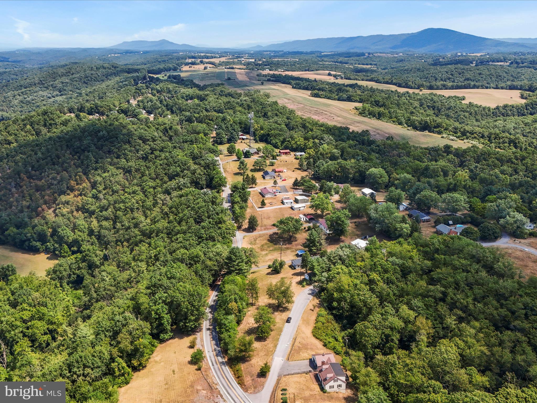 Discover the perfect canvas for your dream home on this 0.487 acre corner lot, nestled in a serene rural residential area of Hancock! Situated at the intersection of Grason Lane and Tollgate Ridge Road. Well and septic system can be installed on a temporary interim basis, and would have to be connected to a future community system within one year once it becomes available. Environmental Conservation district zoning. Quick access to Interstate 70. Schedule your viewing today and start envisioning your future home!