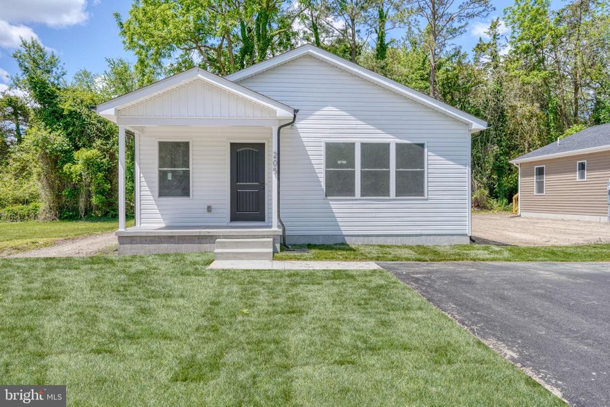 Welcome to 205 Charles Way — brand new construction and ready for its first owner! This beautifully finished 3-bedroom, 2-bath home offers a convenient in-town Georgetown location on a side street with no through traffic and no HOA.

Step inside to an inviting open floor plan filled with natural light, featuring LVP flooring throughout, ceiling fans, soft-close cabinets and drawers, granite countertops, and stainless steel appliances. The spacious primary suite includes a walk-in closet and sliding glass doors leading to the back deck. You’ll also enjoy the covered front porch, generous laundry area, and tasteful modern finishes throughout.

Located close to all the local events Georgetown has to offer, this home is just a short stroll to The Circle and close to restaurants, shopping, and everyday conveniences. Plus, you’re less than 20 miles from Delaware’s resort beaches, making it easy to enjoy the best of both in-town living and coastal Delaware.

Eligible for 100% financing and move-in ready, this home is a wonderful opportunity for buyers looking for new construction with convenience, style, and affordability.