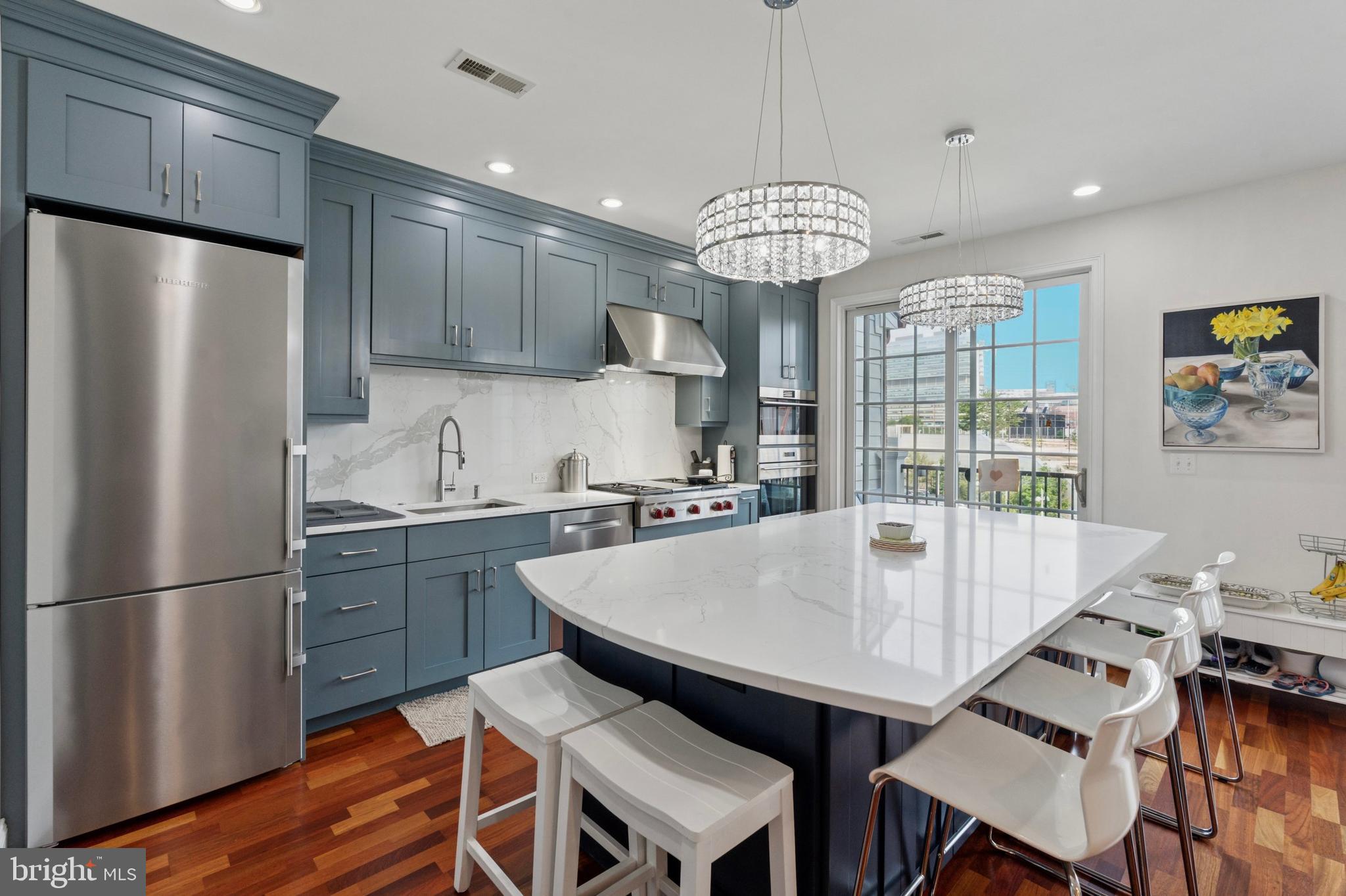 WOW!! The dream home ($190,000+ in upgrades) you have been waiting for at Naval Square....Custom kitchen designed by multi-award winning, international luxury lifestyle interior design company Ferrarini & Co….Kitchen highlights include Double Wolf convection oven and 36 inch Wolf range, Bosch double dishwashers, Liebherr double refrigerators, quartz countertops, ceiling height cabinets and wine fridge....Spacious living and dining room complete with discreet powder room off the side......…. Upper XL primary en suite with walk-in closet, extra built in storage, dual vanity, walk in natural stone tile floor shower... Two large bedrooms feature plentiful closet space and built ins... Newer LG front load washer and dryer...2024 hot water heater......Kitchen and both full baths are not your fathers ordinary Toll Brothers finishes........Want more? Deeded parking space and EV vehichle chargers right outside your door... ... live secure and exterior maintenance free in this national historic community, America’s first Naval Academy (Biddle Hall). Entertain in the Grand Rotunda, chill at the pool or head to the large finess center - mere steps from your door. The rear gate offers direct access to Schuylkill “Boardwalk”, biking / walk trails to South Street/ University City, tennis courts and River Park amenities.... Easy access to UPenn, CHOP, HUP, Drexel, Philadelphia School and Rittenhouse Square. Award winning restuarannts such as Friday, Saturday , Sunday (James Beard Winner), Rival Bros Coffee, Ambrosia, Loco Pez and Illata BYOB just minutes away.... Keep going past Art Museum , Waterworks, Boathouse row uninterrupted 20+ miles to Valley Forge….. Seamless access to I-76, Airport Rail Station or public transport….. Does it get any better.?