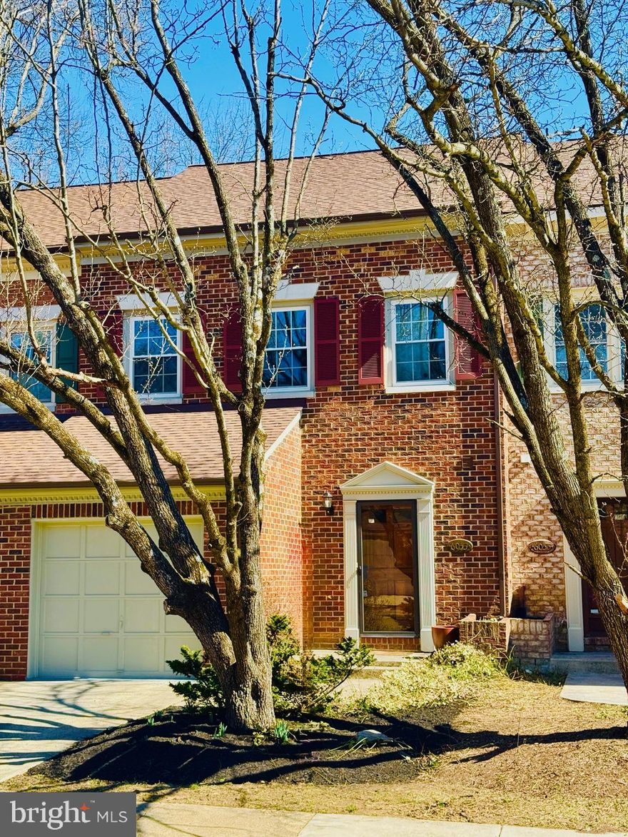 Attractive, spacious and updated home in sought after Woodfield Estates backing to trees. 2,433 total finished square feet. New roof 2025, new kitchen appliances, quartz countertop and LVT flooring  2025. New windows 2025.  Wood floors on main level. Eat-in kitchen. Primary suite with soaking tub & separate shower.  Wood burning fireplace in family area on lower level & laundry room and Storage Room.  Upper level has 2 skylights and full bath. Repainted throughout & updated for next owners. Walk through French doors on main level to a deck off kitchen and living room. Lower level has walk out French door to patio and is fully fenced. Wonderful l ocation for commuting and close to Old Town, Kingstowne for restaurants and amenities.  Many forms of public transport nearby and a short distance to capital beltway, I-95, 395.