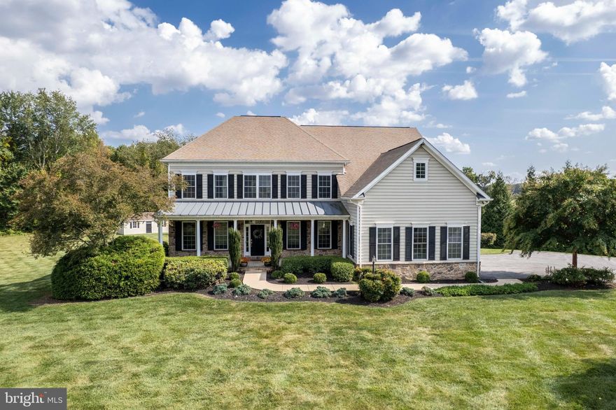 OPEN HOUSE SUNDAY April 26th from 1pm-3pm*Welcome to this beautiful stone front 5BR 4.5Bath custom Colonial with 3 car garage that sits atop 3 private acres in rarely available White Tail Run Estates buffered by Conservation*Exterior features a covered front porch, decorative columns, professional landscape, side loading garage, an oversized maintenance free  deck, hot tub, large storage shed, & 3 acres of mostly level topography buffered by evergreens*Step inside the main level to a welcoming 2 story foyer flanked by a formal living room & dining room both with real hardwood floors*Main level bedroom is also ideal for an office*This area which features wide custom moldings opens up to a 2 story family room with stone gas fireplace, a breakfast area, gourmet kitchen, & a sun room which allows natural light to flow throughout*Kitchen features granite countertops, a large island, pedestal lighting, stainless appliances, & 42 inch maple cabinets*The adjacent sun room flows to your oversized deck & flat private yard*Sizable walk-in panty, half bath, & large 12 ft laundry room finish off this level*The upstairs hallway overlooks the family room with easy access to all 4 upper level bedrooms*The 26 by 17 primary suite has a sitting area, walk in closet, tray ceiling with high end lighting, & a spacious spa like primary bathroom with soaking tub, double sinks, & walk-in shower*All other bedrooms are nicely sized with one having its own dedicated full bath*The lower level is an entertainer’s dream with a 33 by 31 rec room which features a 33 foot wrap around custom bar with granite countertops, pendant lighting, 2nd refrigerator, 2nd microwave, built in shelving, & a cozy Victory castings corner gas fireplace*Most of this level has high end Brazilian hard wood flooring*Another full bathroom, bonus room, storage room, & large utility room add to the versatility of this space*Wide walk out steps make it easy to move items in and out of this level*Note: 2 zone HVAC, propane gas heat, Newer RUUD hot water heater, newer well pressure tank show care by current owners*5700+ finished sq feet of living space*Just minutes from The Links at Challedon, 10  minutes from downtown Mt. Airy, and close to route 70 commuter routes*Discover hill top luxury & tranquility in this extraordinary home*