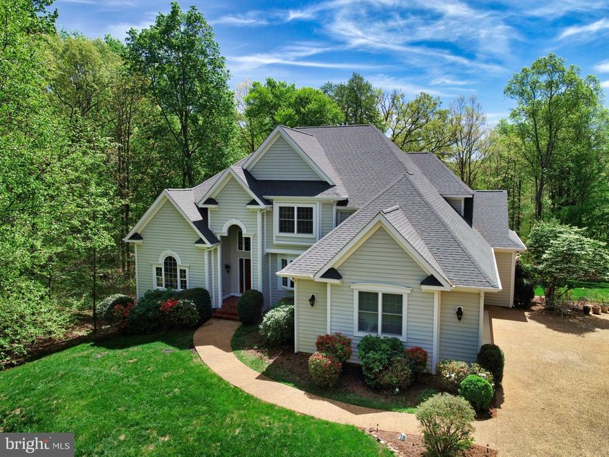 Gorgeous, custom home in the sought after Bentivar neighborhood. Three finished levels with over 6000 finished s.f. The main level features formal living/dining rooms off the main entrance; family room connecting to the kitchen with maple cabinets & solid surface counters. The adjacent breakfast bar / dinette room has a domed ceiling and walkout to the composite rear deck. Primary suite has its own deck and hot tub. Heading upstairs you stop halfway to step into the mid-level office with a wall of windows to enjoy the seasons. The top floor boasts a 2nd BR suite and full bath; two more bedrooms sharing a Jack n Jill bath; a generous exercise/bonus room and a potential 5th bedroom or office (septic is 4 BR design). The terrace/bsmt level has multiple entertainment areas, wet bar and a 4th full bath. Large utility / storage room and sunroom bump out complete the basement level. Two exits to the back yard/patio. Extras include: 3-car garage, 3-zone HVAC, partial house generator, insulated siding, thicker exterior walls, central vac, soft water system, landscape lighting, aggregate stone drive & walkways, shed. Click on the links for a 360-virtual tour and a separate drone aerial tour. No HOA.