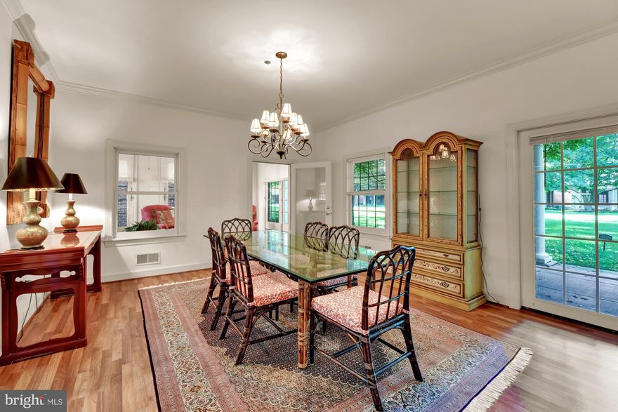 This lovely home has 9' ceilings, crown molding, a working fireplace, beautiful hardwood floors, a brand new dishwasher, beautiful light drenched sunroom, and full size washer and dryer.   The living/dining area has doors leading to the beautiful lawn beyond.  Enjoy year round sunshine in the bright and beautiful sunroom.  The master bedroom includes a large master math with a separate tub and shower and huge walk in closet.  The second bedroom has a cleverly designed office space, and another huge walk in closet.  Your second full bath comes with a shower.  This well appointed home is priced to sell and will not last long.  As a member of our concierge community you will experience such services as amenities as:  weekly housekeeping, linen service, 24/7 emergency response, 24/7 armed guards, 24/7 manned front desk, landscaping, onsite registered nurse 7 days/week, full time entertainment director, fitness instructor offering weekly classes, and so much more.  This is the best place to live out your next adventure!