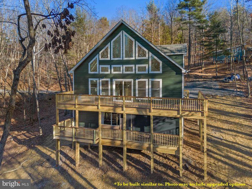 *To be built - All photos similar to from previously sold homes to show possible design options*  

Choose between 2 floor plans to be built on a 0.31 acre lot with road frontage on Crooked Run Dr in Bryce Resort, Basye, VA! 

Choose between two spacious 3 bedroom, 2 bathroom A-Frame floor plans (with unfinished basement and rough in for a 3rd full bathroom).  These homes are sure to provide ample space for your vacation getaway!  With upgraded Hardie board siding, luxury vinyl plank throughout with tile in the bathrooms, large walk in closet in the primary 2nd floor suite, granite/quartz counters, and Wyze smart doorbell/thermostat/deadbolt, this builder is not skimping on the finishes! 

Please see the attached documents to view floor plans and to see the standard included features and finishes. Photos in listing are examples of actual finishes in Seller built and sold homes on the resort.  Optional upgrades may include: fully finishing basement, decorative wooden accent walls, additional decking, Trex, alternative cabinet choices, flooring upgrades, two walk in showers (vs one walk in shower and one tub/shower combo), etc. Please contact listing agent for more details. 

Come build your mountain getaway and enjoy all that a 4 season resort like Bryce Resort has to offer. Skiing, ice skating, snow tubing, mountain bike park, Lake Laura, golfing, etc, as well as membership options for the new pool and sports complex! 

*Home to be built (similar to design photos) by Bryce Enterprises a custom home builder with over 16 years of design and building experience. 
*Contact agent to schedule a tour to see a similar style home currently under construction.