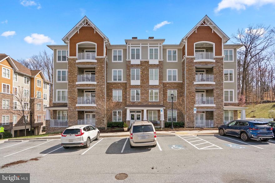 Rarely Available 55+ Active Adult Condo Located in the Sought After Community of Patapsco Overlook in Catonsville!  First Floor Unit is Absolutely Gorgeous & Ready for you to Move Right In!  This Unit Features 2 Bedrooms 2 Bathrooms Plus a Den/Office!  Beautiful Hardwood Flooring Throughout the Main Living Areas.  Gourmet Kitchen with Upgraded Granite Countertops, Center Island with Breakfast Bar, Stainless Steel Appliances & Upgraded Cabinets with Pull-Out Shelving!  Dining Area with French Door Leading to the Private Balcony Overlooking Patapsco Park Where You Will Often See Deer, Birds & Other Wildlife!  Bright & Spacious Living Room Right Off the Kitchen!  Primary Bedroom Suite with a Total of 3 Closets Including a Large Walk-In Closet, an Attached Bathroom with Dual Vanities, Separate Soaking Tub & Stall Shower.  This Condo Also Has a Den/Office with French Doors leading to the Living Room!  Gated Garage Access with 1 Assigned Parking Space & a Designated Storage Unit!  Plenty of Unassigned Parking Spaces too!  Custom Plantation Shutters Installed Throughout!  You Will Also Have Access to a Large Patio Area with 2 Grills for you to Enjoy Summer BBQs!  Patapsco Overlook Community Offers an Abundance of Amenities Such as a Clubhouse Featuring a Conference Room/Meeting Room, Exercise/Fitness Room, Kitchenette, Seating Area with Gas Fireplace, Outdoor Tables, Grill & More!  Location is Great....Close to Catonsville, Historic Street Ellicott City, Patapsco State Park, Restaurants/Shops, BWI, 95, 70 and 695! *Sellers would like to close as soon as possible but will need a rent back through the end of April.