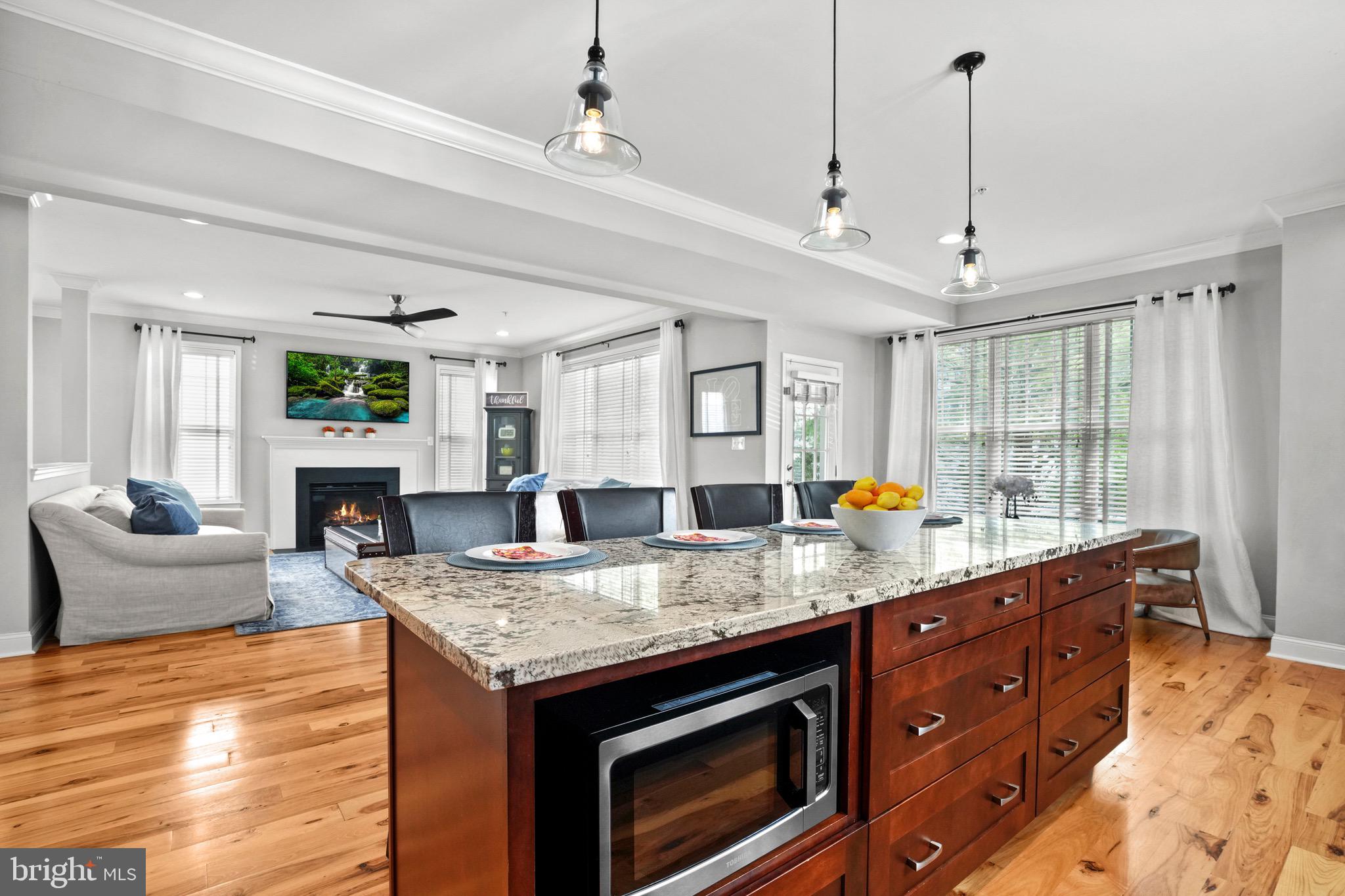 Welcome home to 111 Potters Pond Drive in the desired town of Phoenixville, Chester County. Phoenixville has been ranked #1 by Travel + Leisure magazine in its 2025 list of the 10 Best Small Towns to Live in the United States of America. Completely renovated in 2015! 111 Potters Pond Drive is situated in the low maintenance, exceptional Potters Pond community which is wrapped in open space on both sides of the community & a lovely walking trail which winds past the Potters Pond. Offering nearly $400,000 in improvements & upgrades! This loved home blends clean lines with timeless elegance and modern comfort. Immaculately maintained, featuring a fresh, neutral palette, sleek finishes, and thoughtfully curated details, it offers a crisp look that feels both modern and classic. From the streamlined kitchen to the airy living spaces, every room is designed for effortless living & enduring style. This home features an open & airy floor plan on the first floor. The luxurious first floor flows beautifully with a foyer, powder room, dining room, living room with fireplace & GRAND gourmet kitchen with an abundance of custom cabinets, granite countertops & an exit to the rear deck. The first floor is tastefully decorated with custom Sherwin Williams paint, custom hickory floors that are naturally finished, high ceilings, custom dining room with built in cabinets, upgraded millwork, custom wooden blinds & custom recessed lighting. More than just a space to plan your feasts, this kitchen is a feast for the eyes! Thoughtfully upgraded with high-end finishes, sleek appliances, and stylish design details that elevate every culinary moment. Built with custom, soft close, kitchen cabinetry, LG refrigerator, Kitchen Aid double oven, Bosch dishwasher, whirlpool range, Zephyr hood (vented outside) & anchoring the kitchen is a generously sized breakfast island topped with stunning upgraded granite. The second floor was thoughtfully planned with an oversized loft, often used as a family gathering room, three bedrooms with lush carpet & custom window blinds/Roman shades, hallway bathroom with double sink vanity, custom tiled floor & a conveniently located laundry room with tiled floor (washer, dryer & mini refrigerator included). The primary suite oozes luxury with a high trey ceiling, walk-in closet with custom shelf boarding, custom wooden blinds & a private, custom designed bathroom. This custom-designed primary bath is a true retreat, featuring a meticulously crafted 9-foot tiled shower with three shower heads for a spa-like experience. The space is elevated by a double vanity with bespoke cabinetry, combining exceptional functionality with high-end design. Notable highlights: all upgraded appliances included (washer, dryer, refrigerator), semi-finished basement with Aktiok Jayz flooring & egress window, finished 2 car garage with insulated 16 x 7 garage door, desirable community location, 10 year young roof, 4 year young HVAC system, TVs in the family room & primary suite are included, custom cabinetry throughout, gourmet kitchen with double oven, 2 year young 80 gallon hot water, closet & storage space throughout the home, custom Sherwin Williams paint throughout, first floor custom hickory hardwood naturally finished flooring, upgraded second floor tiled floors & lush carpet, custom Pottery Barn light fixtures, recessed lighting throughout, upgraded light switches with dimmers, ceiling fans & so much more! There is a mix of quiet & energetic things to do as this home is minutes from the walkable, vibrant downtown Phoenixville with restaurants & shops, local YMCA, Kimberton Village, Colonial Theatre, Reeves Park, Reservoir Park, Schuylkill River walking-biking trail, Valley Forge Park (biking, hiking, picnicking) & Limerick Premium Outlets. Easy commute to Philadelphia & King of Prussia via routes 422, 202, 76, 23, 29, the AMTRAK Paoli train station & the turnpike in Great Valley. This home invites you to BUY ME!