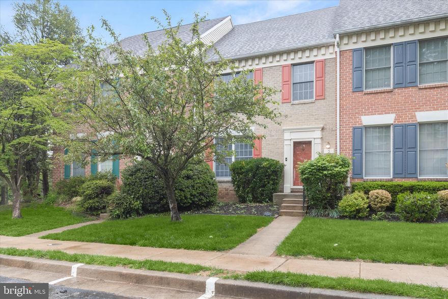 Welcome to this three-level townhome offering three bedrooms with three-full and one-half bathrooms in the desirable Chapel Gate neighborhood in Mays Chapel. As you enter, a neutral color palette and hardwood floors that extend throughout the main level create a warm and inviting atmosphere. The eat-in kitchen features granite counters, a beadboard backsplash, recessed lighting, a pantry, and space for a breakfast table. Open-concept living and dining areas provide ample room for gatherings, with crown moldings and sliding glass doors leading to the deck. A half bathroom completes this level. Upstairs showcases recently replaced hardwood floors. The primary bedroom suite boasts a vaulted ceiling, two closets, one of which is a walk-in, and a luxurious en-suite bathroom with a frameless walk-in shower and dual-sink vanity. Two additional bedrooms share an updated bathroom with a tiled tub shower. A laundry closet with a full-size stacked washer and dryer adds tremendous convenience upstairs. The finished lower level expands the living space with a spacious recreation room that has a wood-burning fireplace and sliders opening to the rear patio and backyard. A versatile bonus room, complete with a walk-in closet and an adjacent full bathroom with a glass-enclosed walk-in shower, offers potential as an additional bedroom. A large storage room and a utility room with a second washer and dryer set provide extra functionality. Additional highlights include updated bathrooms and dual-zoned heating and cooling systems. Conveniently located just minutes from shopping, dining, and everyday amenities, with quick access to major commuter routes 83 and 695. Some images have been virtually staged.