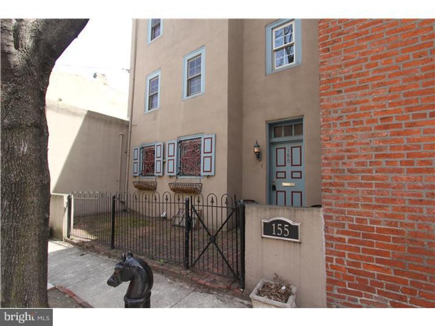 This turn of the century Corner 3 bedroom 2 full bath with 2,456 square feet is a rare opportunity in Northern Liberties. With original features such as 6 wood burning fireplaces and the potential to build a 2 story addition over the private garage equates to amazing potential for a prospective home owner. This 3 story home has curb appeal with original shutters, a brick front gated courtyard and yes a 12x22 foot garage! Enter in through the gated courtyard to an open foyer. To the left is a large kitchen with access to the garage. To the right through stained glass French doors is a large living room with decorative mantle and built in wood burning cast iron insert. Access to the huge finished basement from the foyer. The basement is completely tiled, includes washer and dryer and has plenty of counter height closets and sink. The is a large hearth fire place in basement as well. From the foyer the solid wood stairs with decorative iron detail leads to the 2nd floor. There are to bedrooms each with fireplaces and a hall bath. The bath features decorative tile floors, a storage vanity with vessel sink and a shower. The 3rd floor Master suit is enormous with a large bedroom, a fire place, 2 closets (skylight access from the closet on the left) a hall storage closet and a master bath with soaring ceilings. The bathroom includes a corner soaking tub, glass block shower, and a fireplace. There is central air, gas heating and cooking, and forced hot air heat. Located close to Jerry's Bar, Heritage Jazz Club, & the Piazza . (Bonus: This home has potential for immediate construction of a 528 sq. ft. addition on top of garage)