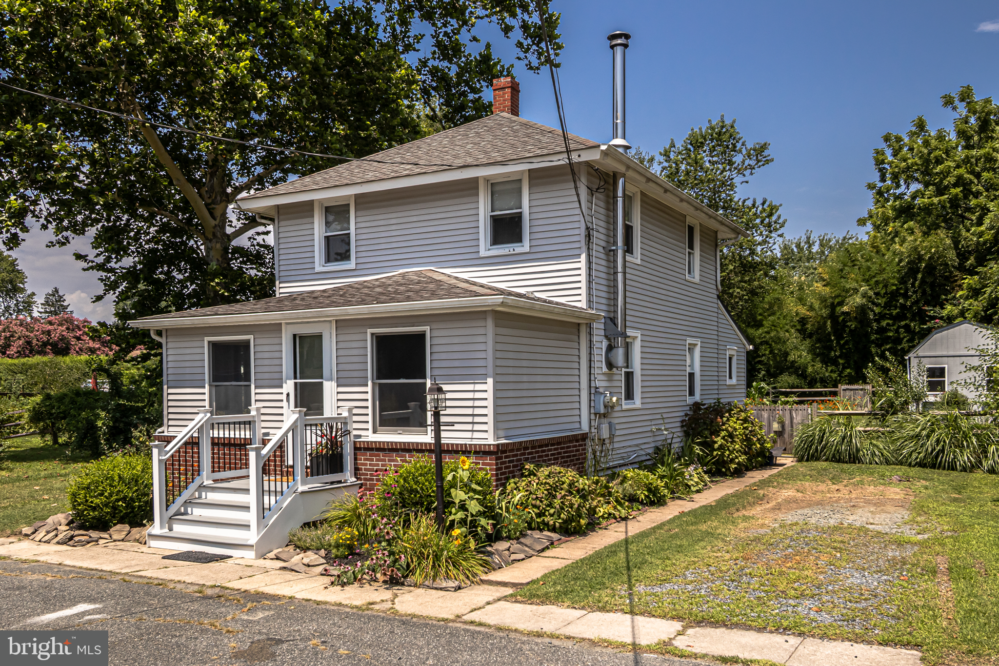Lovely, detached home in quaint North Chesapeake City just a block away from the C & D Canal. A must see this home features many modern updates while keeping its early 20th century charm. Entering this home on the main level you'll step into the spacious living area with beautiful hardwood floors, wood burning stove and an abundance of natural light. The living area is open to the dining room area flowing into the updated kitchen. Amenities in the updated kitchen include a plethora of cabinets, a unique recessed wood counter with cabinets that would make a great coffee/espresso bar. Stainless steel appliances, Jenn-Air double oven, Frigidaire premium cook-top, Fisher Paykel double drawer dishwasher, soap stone countertops, farmhouse style sink & luxury vinyl plank floor are just a few of the updates. Up the steps from the main living area you'll find 3 bedrooms all with refinished original yellow pine floors. Additional updates include a water heater, energy efficient windows, attic fan & '58 Basement Foundation & Waterproofing System. The fenced in rear yard includes a 12 X 12 deck, patio with fire-pit, numerous raised flower & vegetable boxes and a refurbished 19 X 12 shed w/loft all backing to a naturally landscaped rear border. The ideal location provides convenient access to the Ben Cardin/Mike Castle Walking, Jogging & Bicycling Trail stretching 15.3 miles from Chesapeake City Md to Delaware City DE along the C & D Canal. A host of additional entertainment activities this great community offers include in town holiday festivals, parades, holiday fireworks displays, restaurants and a public boat ramp. This property is also conveniently located to Bohemia Manor Schools, major employment centers, hospitals, easy access to I-95 and commutator rail service. Treat yourself to a tour of this unique home and community, you will be impressed !!! Living space square footage is incorrect on SDAT form. Estimated square footage of living space is 1300 sq ft.