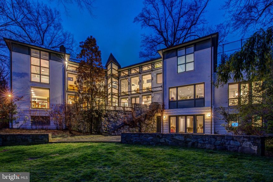 STUNNING Forest Hills contemporary set on a spectacular 1/2 acre+ lot backing to the woodland grounds of the Hillwood Museum. Over 10,500 SF of bright and airy living space with serene parkland vistas through every window. 7 bedrooms, 7 full baths, and 2 half baths throughout. A great room with 22' ceilings, brand new Bulthaup kitchen/family room with Wolf/Sub-Zero/Miele appliances, a second floor sport court, a luxe master suite with 2 en suite bath/dressing rooms, a main level guest suite, and a 2-car garage and mudroom are just some of the many noteworthy features. Fabulous location in quiet yet super convenient Forest Hills enclave with easy access to Rock Creek Park & Connecticut Avenue and walkable to multiple Metros, shops, & restaurants!  NOTE:  PHOTOS IN THE VIRTUAL TOUR AND INDIVIDUAL PHOTOS IN MLS THAT SHOW FURNISHED ROOMS ARE VIRTUAL STAGING ONLY.