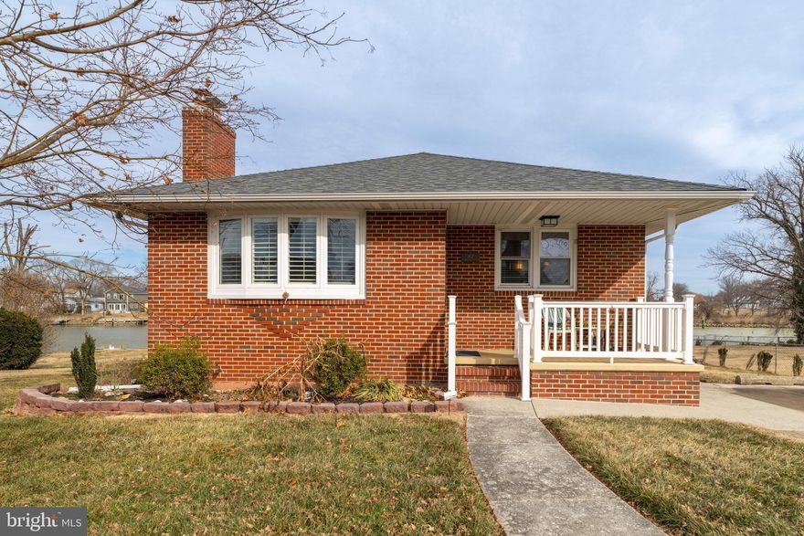 Beautifully renovated 3-bedroom waterfront home on Bear Creek!  Stunning eat-in kitchen with loads of cabinet space, SS appliances and quartz countertops.  Large living room with decorative fireplace.  Three large bedrooms on main level and a hall bath.  Lower level is almost totally finished space, with a great room, laundry room, full bath, utility room and storage.  Huge flat yard out to the water, with a pier.  Some restrictions, see Disclosures.  Minimum credit score is 725.