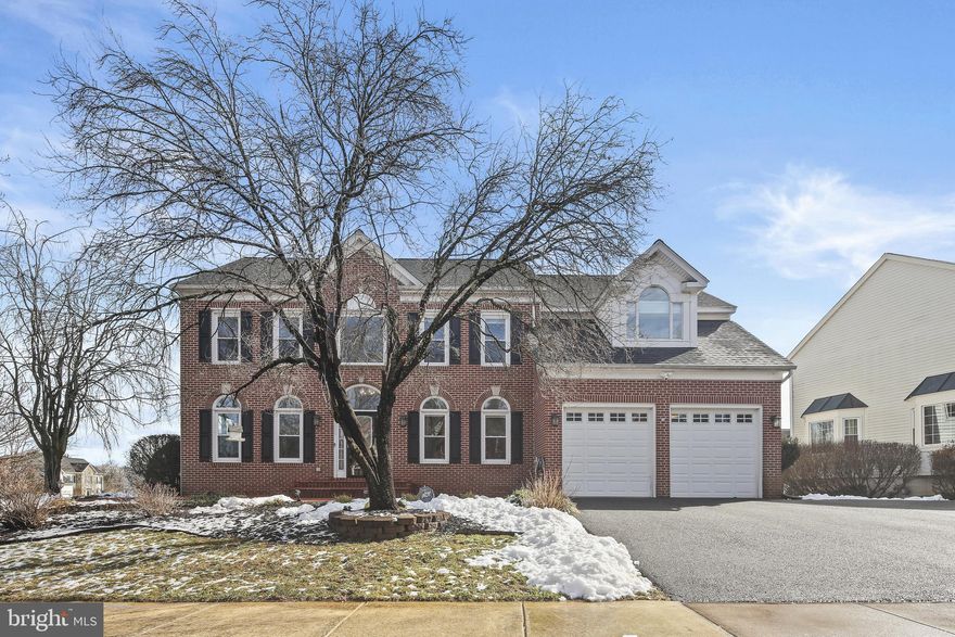 The offer deadline is Monday, March 3rd at 5 pm. Welcome to this gorgeous 5-bedroom, 4.5-bath brick-front colonial home situated on a desirable corner lot in the sought-after Oak Grove Community. Move-in ready and meticulously maintained, this home offers a perfect blend of elegance, modern updates, and functional living spaces. Head into the impressive two-story foyer, where natural light pours in through expansive windows. To the right, a private home office/study provides the perfect workspace, while to the left, the formal living and dining rooms showcase exquisite crown and chair rail molding. Throughout this level, luxury vinyl plank (LVP) flooring enhances both style and durability.



The gourmet kitchen has been beautifully updated with white shaker cabinets, quartz countertops, a subway tile backsplash, stainless steel appliances, and a center island—perfect for meal prep and entertaining. The coffee and wine bar with a built-in beverage fridge is an added bonus to the space. Unwind in the spacious family room, featuring a cozy fireplace and access to an expansive deck, creating the perfect setting for both relaxing and entertaining outdoors. A mud/laundry room with garage access and a convenient half bath complete this level.



The primary suite is a true retreat with a sitting area, vaulted ceiling, and two walk-in closets. The spa-like ensuite bath offers dual vanities, a soaking tub, and a separate standing shower. A second bedroom features its own private ensuite bath with a gorgeous standing shower. Two additional generously sized bedrooms share a well-appointed hall bath with a double vanity.



The light-filled, finished walk-up basement is designed for entertainment and versatility. Enjoy a large rec room, a game room, a private 5th bedroom, and a full bath—ideal for guests or multi-generational living. There is also an oversized utility/storage room with a kitchenette/wet bar that offers endless possibilities. 



The backyard features a fenced yard for privacy and plenty of space for outdoor activities. There's plenty of parking in the attached 2-car garage plus a spacious driveway. Some of the recent upgrades include the carpeting (2025), water heater (2024), remodeled kitchen (2023), roof and siding (2023), furnace (2018), A/C (2017), and driveway (2016) just to name a few.



This home is conveniently located just minutes from commuter routes, and the heart of Olney, where you’ll find shopping, dining, and entertainment options. Welcome Home!