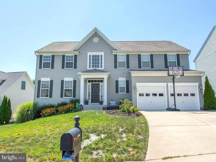 Welcome Home!! take a 3D tour..enjoy your large kitchen or light filled sunroom or call the neighbors for a bar-b-q on your oversized deck with  trees as background, uniquely spacious master bedrm w/his/hers walk- in closets, all bedrms have remote control fan/lights, crown/chair molding, custom shades, media room, extra bedrm/office or home gym are just a few options for the basement, stone patio