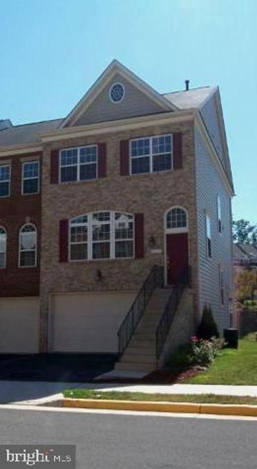 Under Contract in 1 day!!  Thinking of selling your home? Call Me! I'd love  to help you with all your Real Estate needs                  Sought after Manassas Park Station Townhome. Don't miss out! Make your appt to see this Beautiful Turnkey End unit. Call me to be the 1st to see & make an offer or tell your agent to contact me. You know it will not last! This Pride of Ownership home has 3 bedrooms, 3.5 bathrooms, & 2 car garage. Floors have been upgraded to beautiful Laminate floors throughout the Main Level & 3rd level Bedrooms and hall . The walkout Basement, has durable vinyl floors & is nicely finished with a built in Ikea Entertainment Center (that convey), a Fireplace, & a Full bathroom. There are 2 doors that lead to the newly paved fenced patio.  The main floor sits on the 2nd level. You walk into the Open and Bright Livingroom & Formal Dining & a 1/2 bath. The Kitchen and Breakfast/2nd sitting area are located towards the back. The Open Kitchen boasts upgraded cabinets and granite counter tops, Gas stove top, built in Microwave and Oven, & a built in desk. The Large kitchen Island has room to set stools for extra seating. The extra Breakfast space can also be used as a sitting area where you can cozy up to the 2nd fireplace. Yes, I said 2nd fireplace. From the sitting space you can walk out the sliding door onto the deck where you can enjoy the view of the Community Pool. The Master bedroom has its own master bath with shower and separate large tub. And yes it has a walk in closet.  To make Laundry a breeze you will find the Washer & Dryer on this level. The 2nd, 3rd bedroom and 3rd bathroom are on the other side of the hall.  A/C & Furnice replaced 2020. VRE is within walking distance or a 2 min drive! Train is about a 1hr commute into L'Enfant in DC.  You will love the privacy of this community and the closeness to shopping off Liberia. 10 min drive to Manassas Mall, 15 min to Centreville, 20min to Fairfax, 20min to Woodbridge. About 30 min to Dulles & only 30 min to Orange Metro Nutley exit. Call me to view and submit your offer quick.